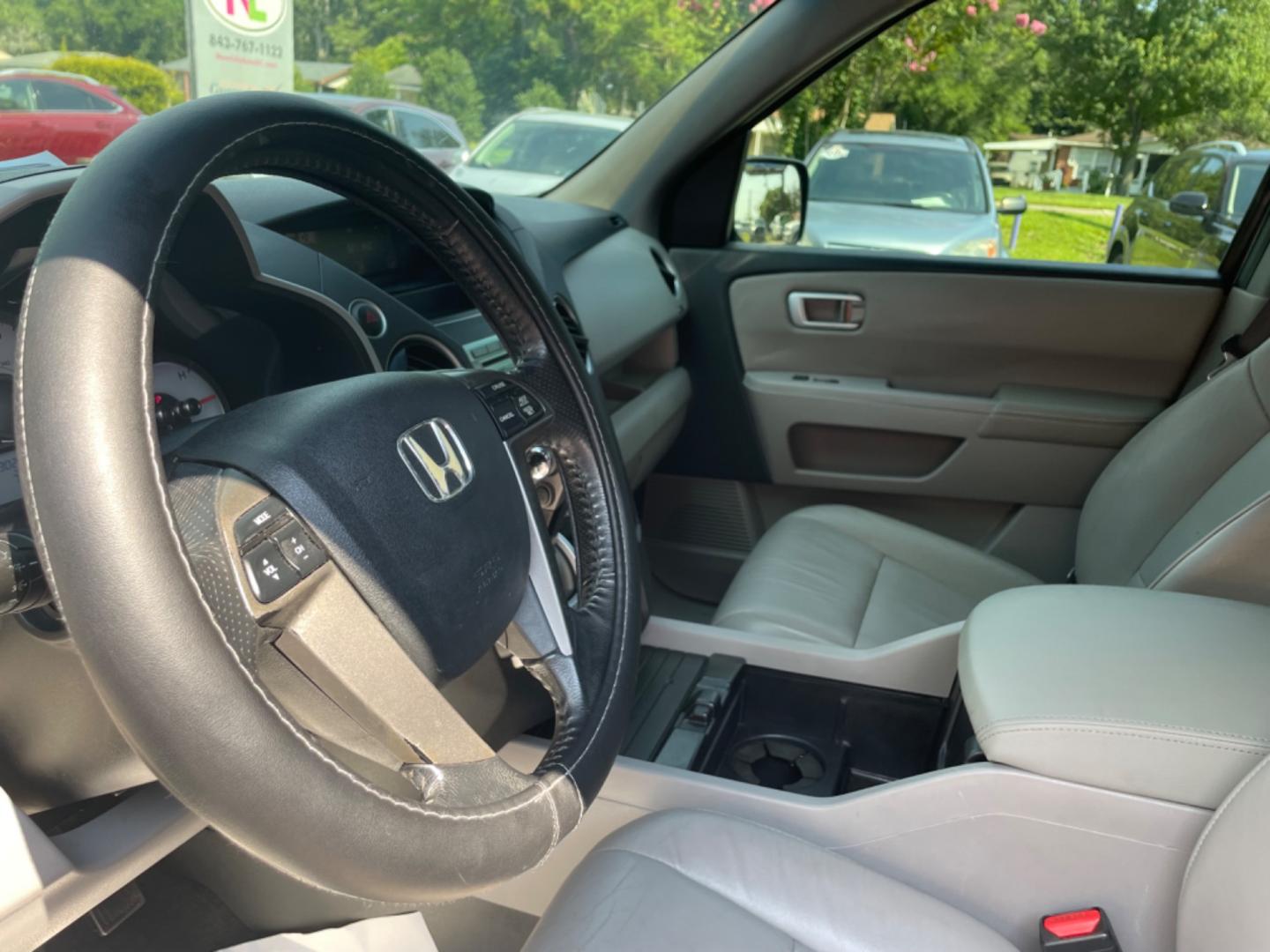 2011 BLUE HONDA PILOT EX-L W/DVD (5FNYF3H66BB) with an 3.5L engine, Automatic transmission, located at 5103 Dorchester Rd., Charleston, SC, 29418-5607, (843) 767-1122, 36.245171, -115.228050 - Photo#24