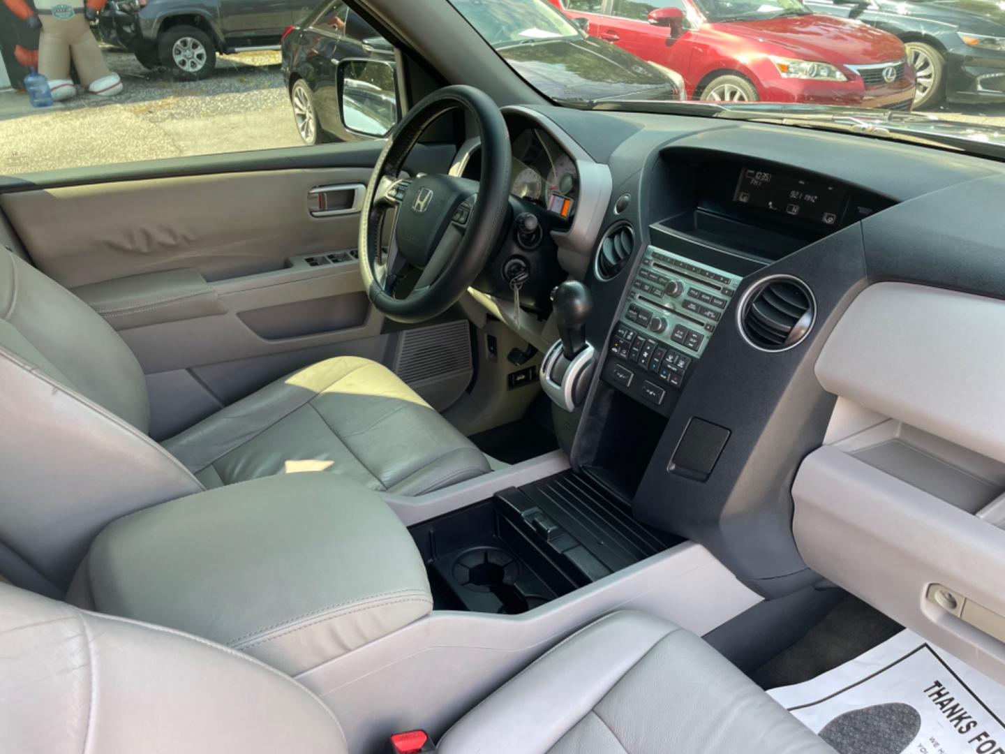 2011 BLUE HONDA PILOT EX-L W/DVD (5FNYF3H66BB) with an 3.5L engine, Automatic transmission, located at 5103 Dorchester Rd., Charleston, SC, 29418-5607, (843) 767-1122, 36.245171, -115.228050 - Photo#8