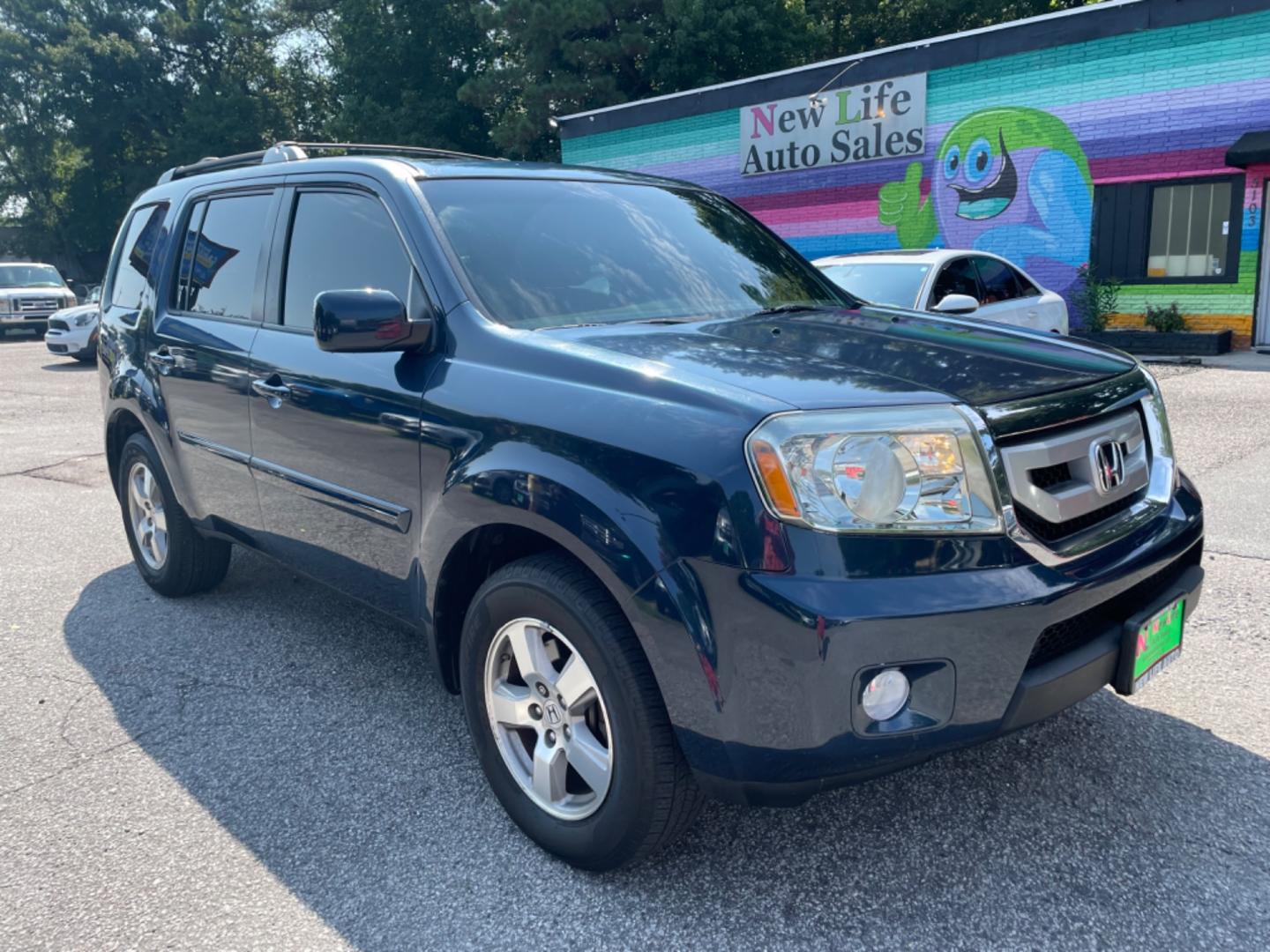 2011 BLUE HONDA PILOT EX-L W/DVD (5FNYF3H66BB) with an 3.5L engine, Automatic transmission, located at 5103 Dorchester Rd., Charleston, SC, 29418-5607, (843) 767-1122, 36.245171, -115.228050 - Photo#0