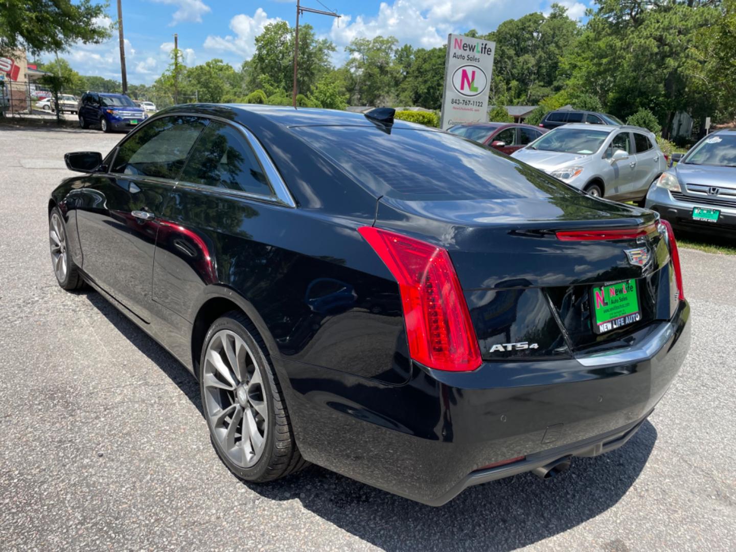 2015 BLACK CADILLAC ATS 2.0T LUXURY (1G6AH1RX0F0) with an 2.0L engine, Automatic transmission, located at 5103 Dorchester Rd., Charleston, SC, 29418-5607, (843) 767-1122, 36.245171, -115.228050 - Local Trade-in with Leather, Sunroof, Navigation, Backup Camera, Bose Stereo with Sat/AUX/Bluetooth, Voice Activation Hands-free Phone, Dual Climate Control, Power Everything (windows, locks, seats, mirrors), Memory/Heated Seats, Push Button Start, Keyless Entry, Alloy Wheels. 125k miles Located at - Photo#4