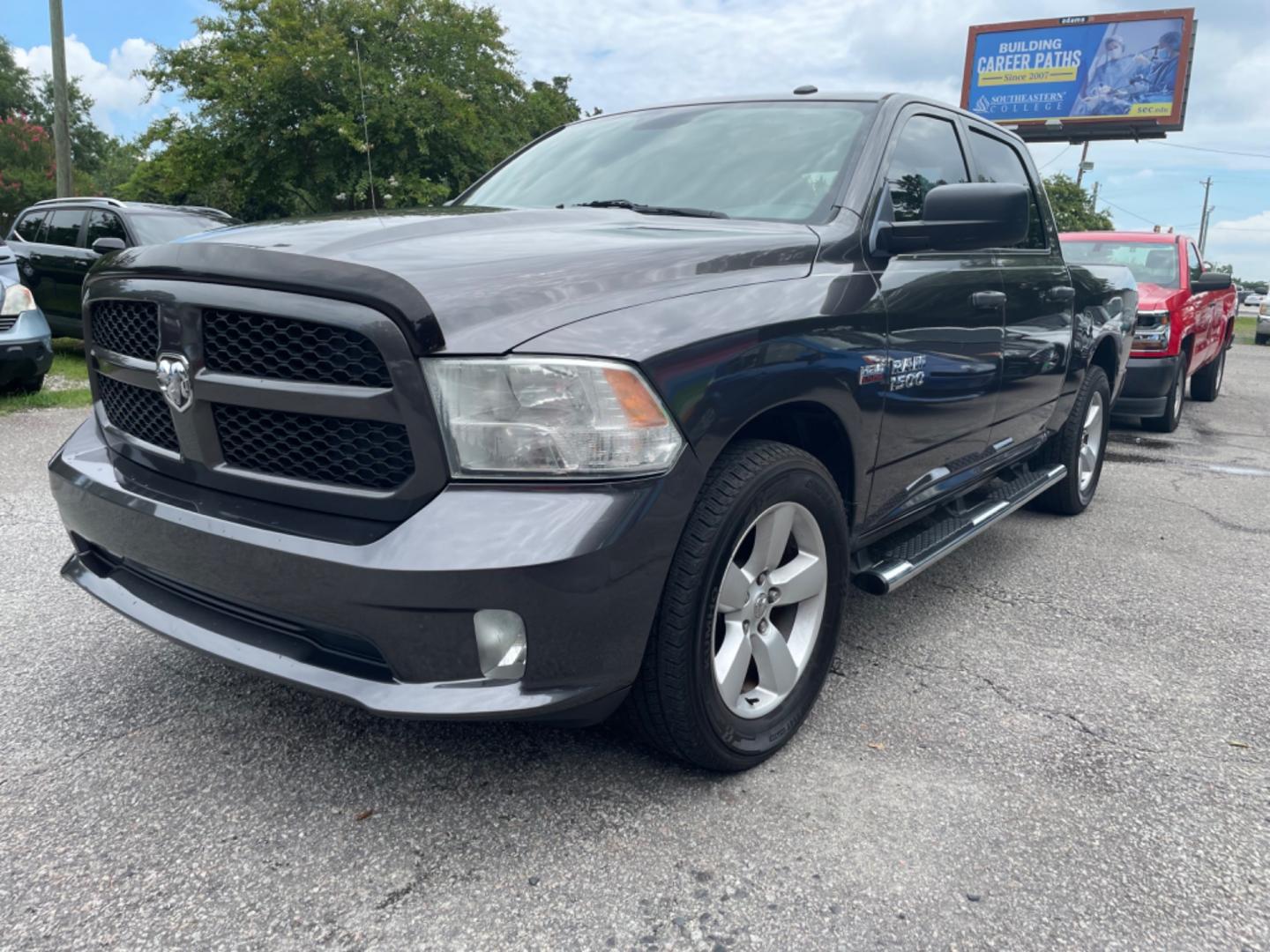 2016 GRAY RAM 1500 TRADESMAN (3C6RR6KT3GG) with an 5.7L engine, Automatic transmission, located at 5103 Dorchester Rd., Charleston, SC, 29418-5607, (843) 767-1122, 36.245171, -115.228050 - Clean Interior with Radio/AUX/Sat/Bluetooth, Power Windows, Power Locks, Power Mirrors, Keyless Entry, Running Boards, Bed Liner, Alloy Wheels, Tow Package. Local Trade-in! 126k miles Located at New Life Auto Sales! 2023 WINNER for Post & Courier's Charleston's Choice Pre-owned Car Dealer AND 2018- - Photo#2