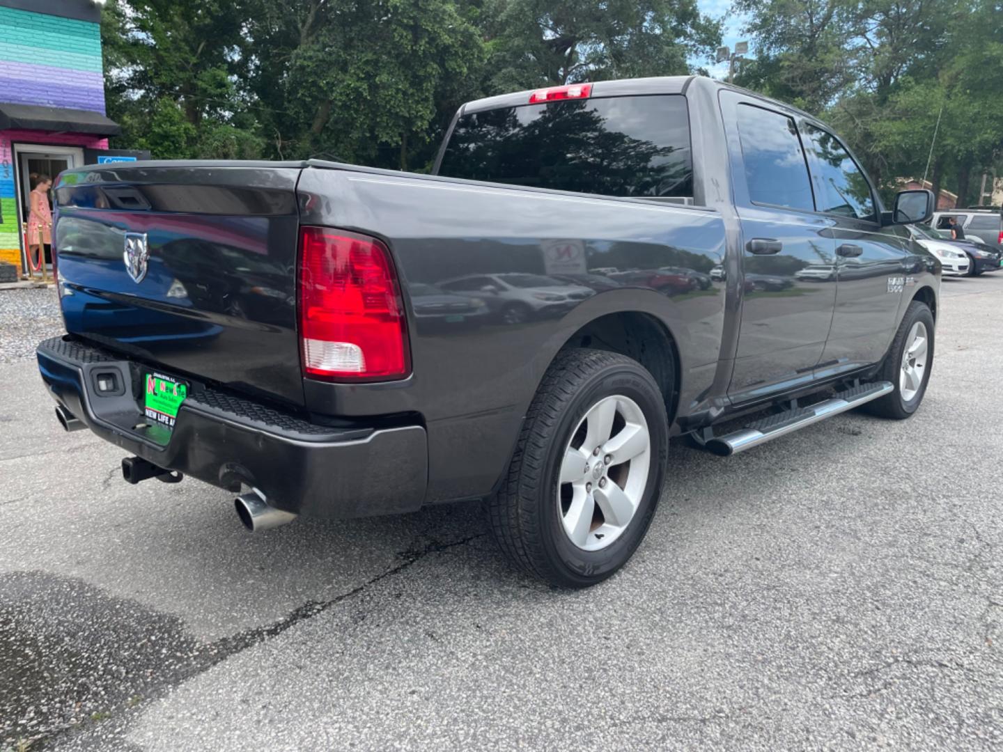 2016 GRAY RAM 1500 TRADESMAN (3C6RR6KT3GG) with an 5.7L engine, Automatic transmission, located at 5103 Dorchester Rd., Charleston, SC, 29418-5607, (843) 767-1122, 36.245171, -115.228050 - Clean Interior with Radio/AUX/Sat/Bluetooth, Power Windows, Power Locks, Power Mirrors, Keyless Entry, Running Boards, Bed Liner, Alloy Wheels, Tow Package. Local Trade-in! 126k miles Located at New Life Auto Sales! 2023 WINNER for Post & Courier's Charleston's Choice Pre-owned Car Dealer AND 2018- - Photo#6