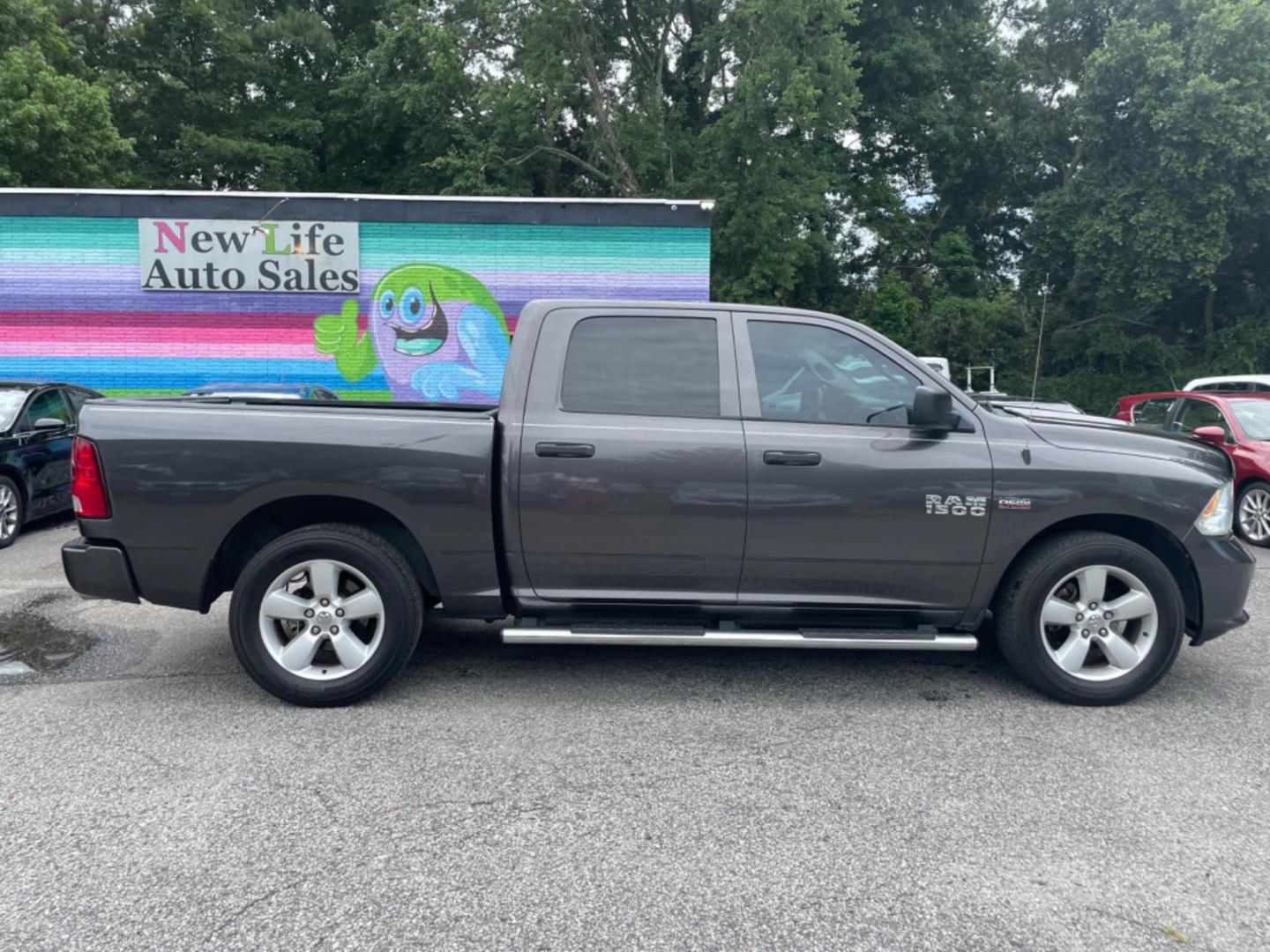 2016 GRAY RAM 1500 TRADESMAN (3C6RR6KT3GG) with an 5.7L engine, Automatic transmission, located at 5103 Dorchester Rd., Charleston, SC, 29418-5607, (843) 767-1122, 36.245171, -115.228050 - Clean Interior with Radio/AUX/Sat/Bluetooth, Power Windows, Power Locks, Power Mirrors, Keyless Entry, Running Boards, Bed Liner, Alloy Wheels, Tow Package. Local Trade-in! 126k miles Located at New Life Auto Sales! 2023 WINNER for Post & Courier's Charleston's Choice Pre-owned Car Dealer AND 2018- - Photo#7