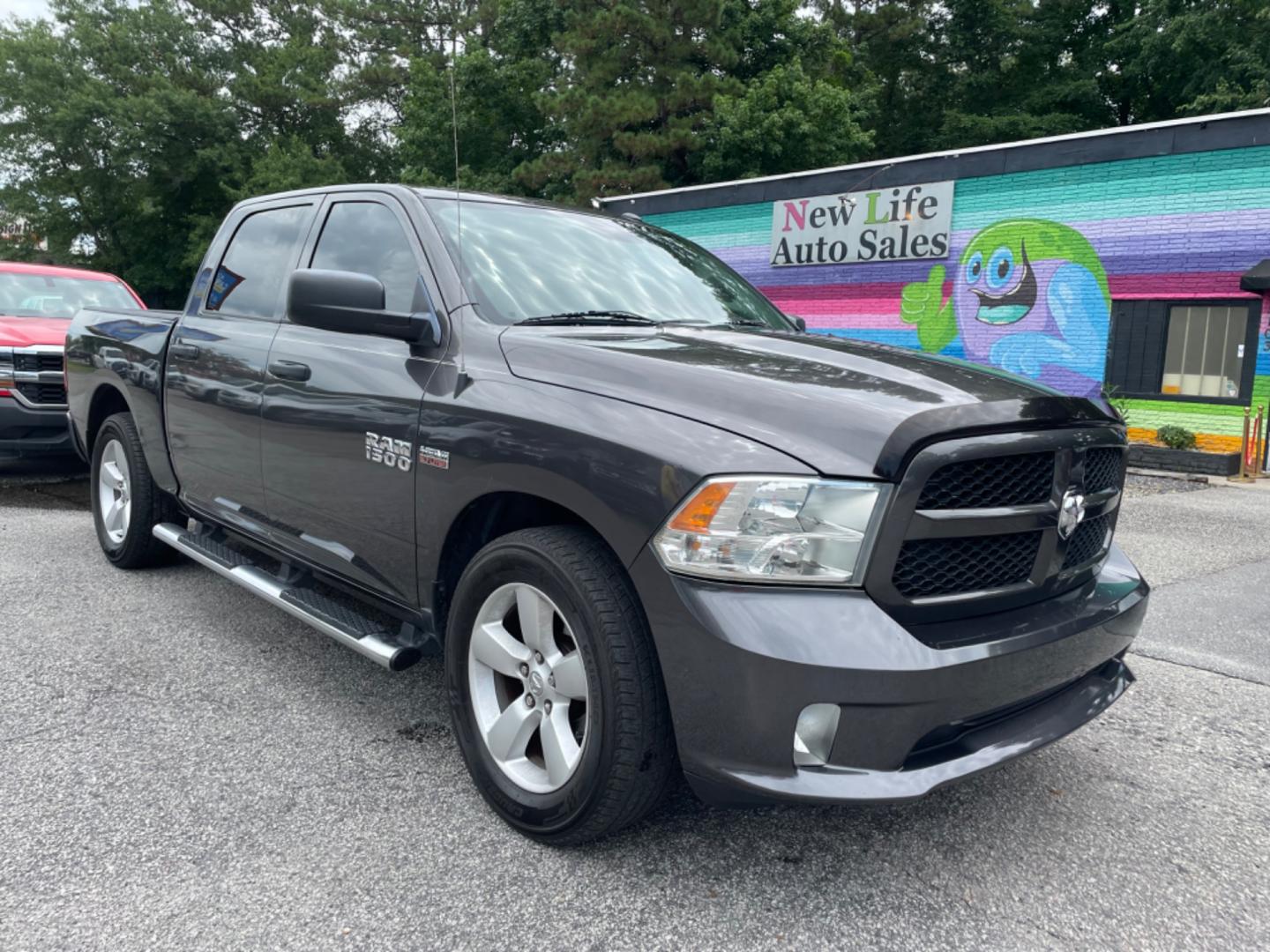 2016 GRAY RAM 1500 TRADESMAN (3C6RR6KT3GG) with an 5.7L engine, Automatic transmission, located at 5103 Dorchester Rd., Charleston, SC, 29418-5607, (843) 767-1122, 36.245171, -115.228050 - Clean Interior with Radio/AUX/Sat/Bluetooth, Power Windows, Power Locks, Power Mirrors, Keyless Entry, Running Boards, Bed Liner, Alloy Wheels, Tow Package. Local Trade-in! 126k miles Located at New Life Auto Sales! 2023 WINNER for Post & Courier's Charleston's Choice Pre-owned Car Dealer AND 2018- - Photo#0