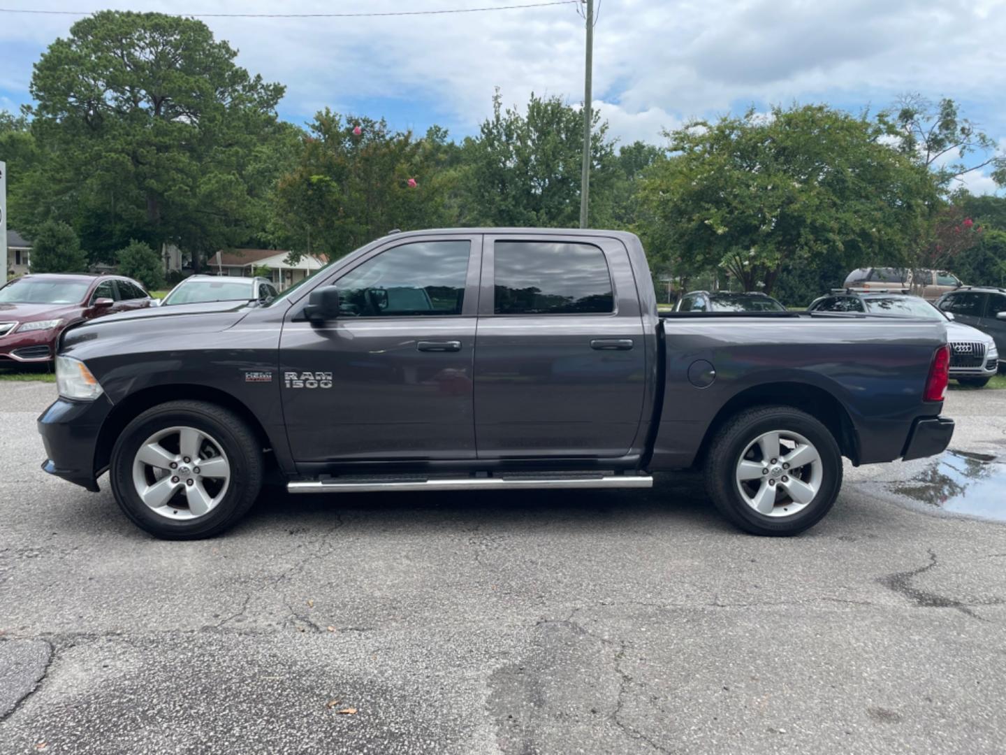 2016 GRAY RAM 1500 TRADESMAN (3C6RR6KT3GG) with an 5.7L engine, Automatic transmission, located at 5103 Dorchester Rd., Charleston, SC, 29418-5607, (843) 767-1122, 36.245171, -115.228050 - Clean Interior with Radio/AUX/Sat/Bluetooth, Power Windows, Power Locks, Power Mirrors, Keyless Entry, Running Boards, Bed Liner, Alloy Wheels, Tow Package. Local Trade-in! 126k miles Located at New Life Auto Sales! 2023 WINNER for Post & Courier's Charleston's Choice Pre-owned Car Dealer AND 2018- - Photo#3