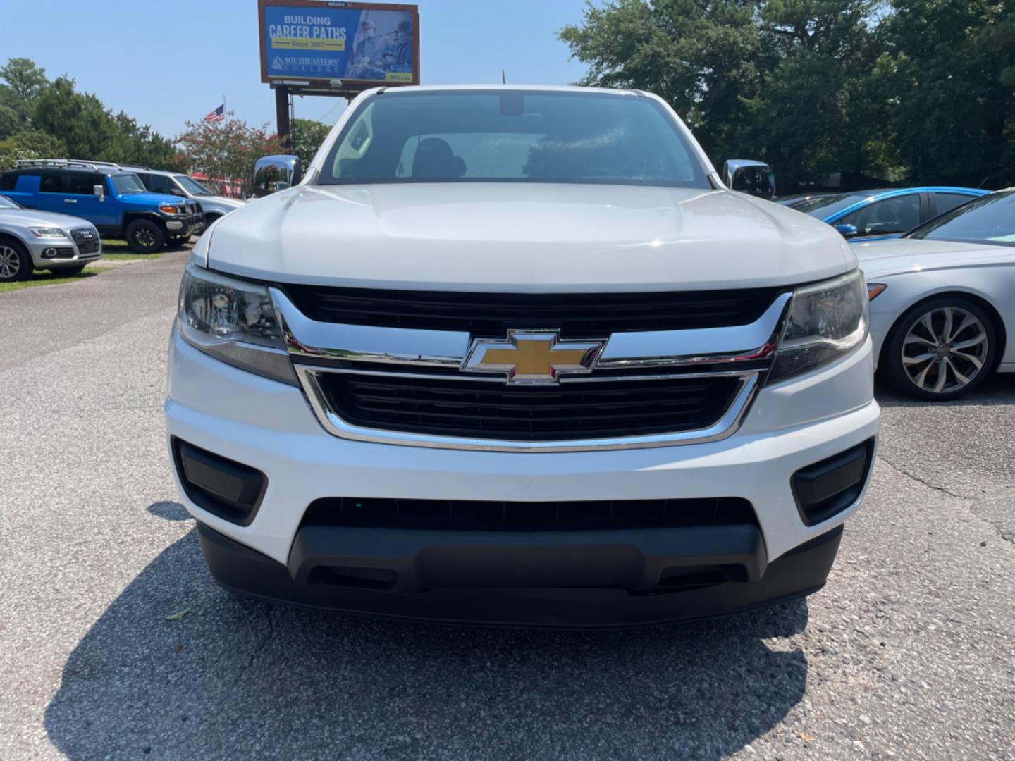 2016 WHITE CHEVROLET COLORADO WORK TRUCK (1GCHSBEA0G1) with an 2.5L engine, Automatic transmission, located at 5103 Dorchester Rd., Charleston, SC, 29418-5607, (843) 767-1122, 36.245171, -115.228050 - Clean interior with Backup Camera, USB/AUX/AM/FM, Power Driver's Seat, Power Windows, Power Locks, Power Mirrors, Over-head Bed Light, Bed Liner, Tow Package, Alloy Wheels. Only 98k miles! Located at New Life Auto Sales! 2023 WINNER for Post & Courier's Charleston's Choice Pre-owned Car Dealer AND - Photo#1