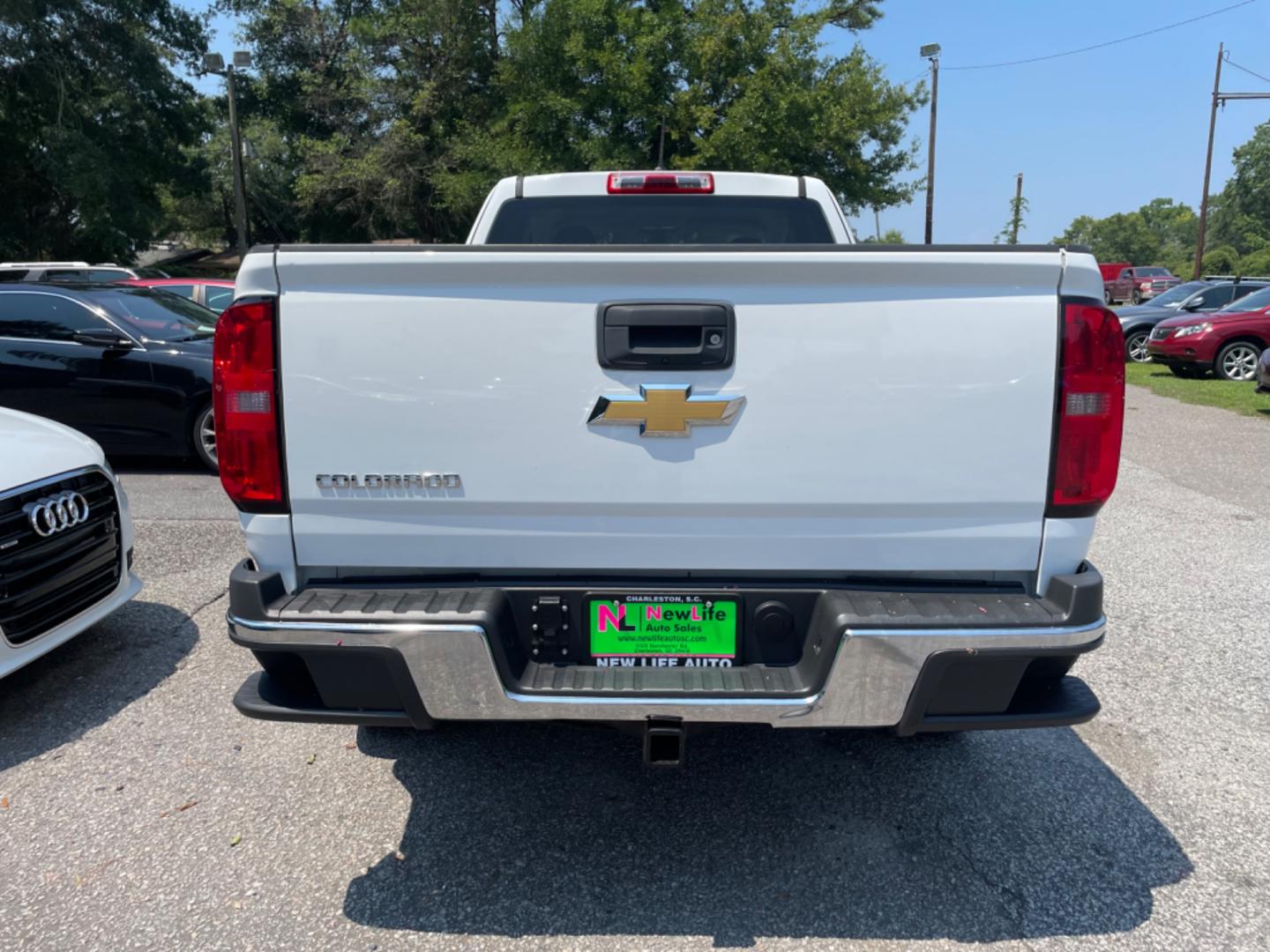 2016 WHITE CHEVROLET COLORADO WORK TRUCK (1GCHSBEA0G1) with an 2.5L engine, Automatic transmission, located at 5103 Dorchester Rd., Charleston, SC, 29418-5607, (843) 767-1122, 36.245171, -115.228050 - Clean interior with Backup Camera, USB/AUX/AM/FM, Power Driver's Seat, Power Windows, Power Locks, Power Mirrors, Over-head Bed Light, Bed Liner, Tow Package, Alloy Wheels. Only 98k miles! Located at New Life Auto Sales! 2023 WINNER for Post & Courier's Charleston's Choice Pre-owned Car Dealer AND - Photo#5