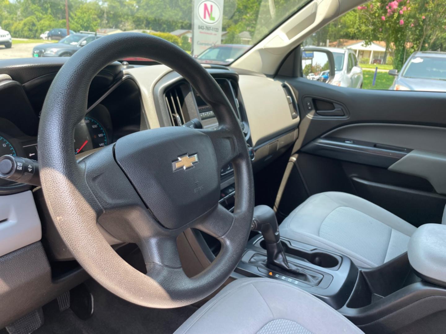 2016 WHITE CHEVROLET COLORADO WORK TRUCK (1GCHSBEA0G1) with an 2.5L engine, Automatic transmission, located at 5103 Dorchester Rd., Charleston, SC, 29418-5607, (843) 767-1122, 36.245171, -115.228050 - Clean interior with Backup Camera, USB/AUX/AM/FM, Power Driver's Seat, Power Windows, Power Locks, Power Mirrors, Over-head Bed Light, Bed Liner, Tow Package, Alloy Wheels. Only 98k miles! Located at New Life Auto Sales! 2023 WINNER for Post & Courier's Charleston's Choice Pre-owned Car Dealer AND - Photo#18