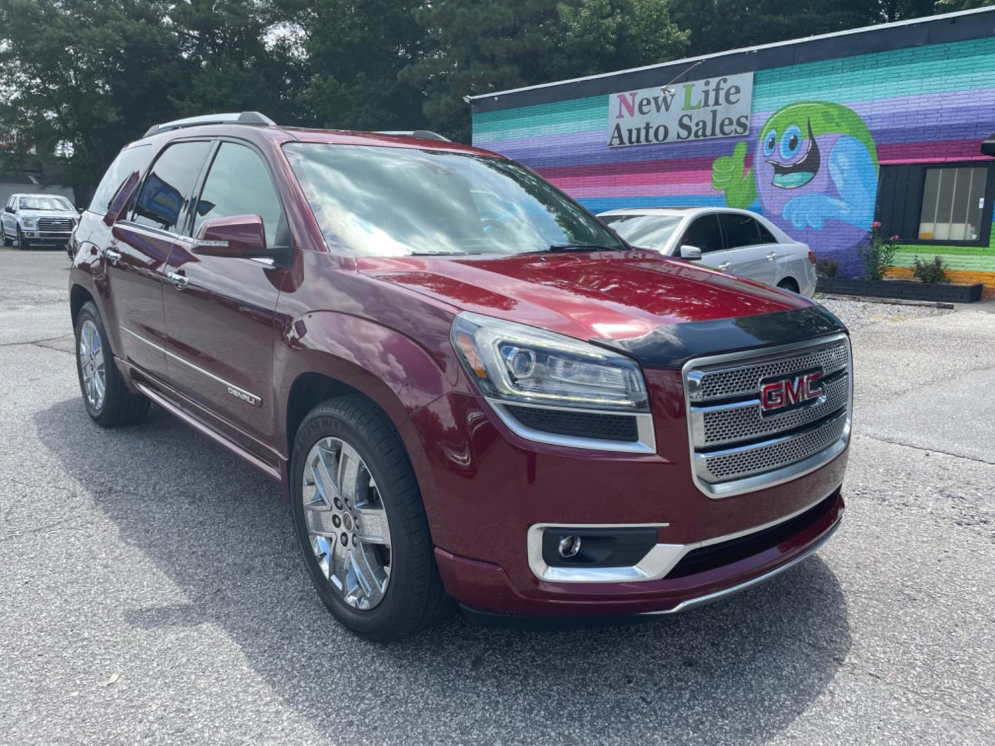 2016 RED GMC ACADIA DENALI (1GKKRTKD5GJ) with an 3.6L engine, Automatic transmission, located at 5103 Dorchester Rd., Charleston, SC, 29418-5607, (843) 767-1122, 36.245171, -115.228050 - Photo#0