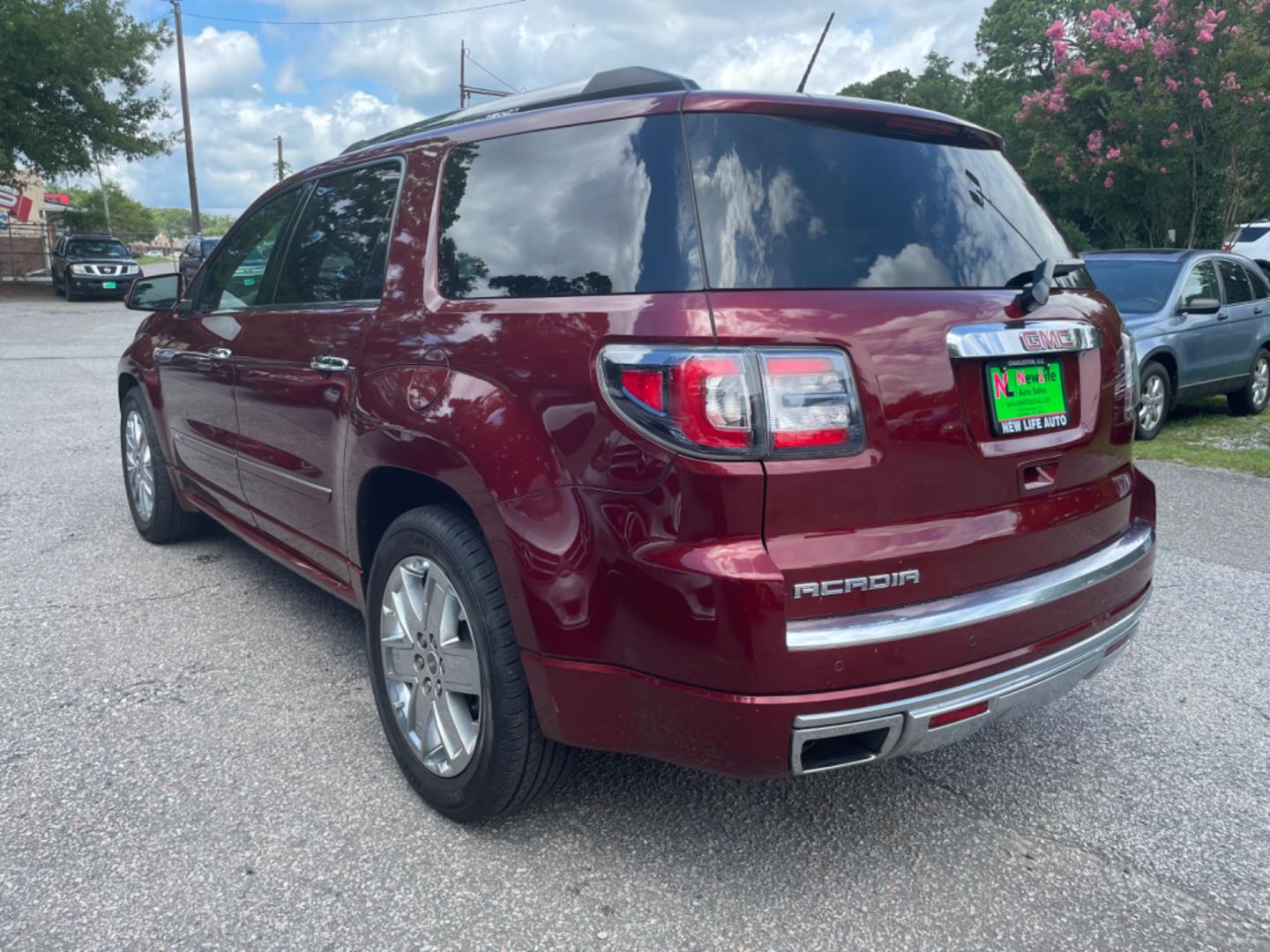 2016 RED GMC ACADIA DENALI (1GKKRTKD5GJ) with an 3.6L engine, Automatic transmission, located at 5103 Dorchester Rd., Charleston, SC, 29418-5607, (843) 767-1122, 36.245171, -115.228050 - Leather, Double Sunroof, Navigation, Backup Camera, Bose Stereo with CD/AUX/Sat/ Bluetooth, Dual Climate Control, Power Everything (windows, locks, seats, mirrors), Power Liftgate, Heated/Cooled/Memory Seating, Middle Row Captain's Seating, Third Row, Keyless Entry, Tow Package, Chrome Wheels. 114k - Photo#4