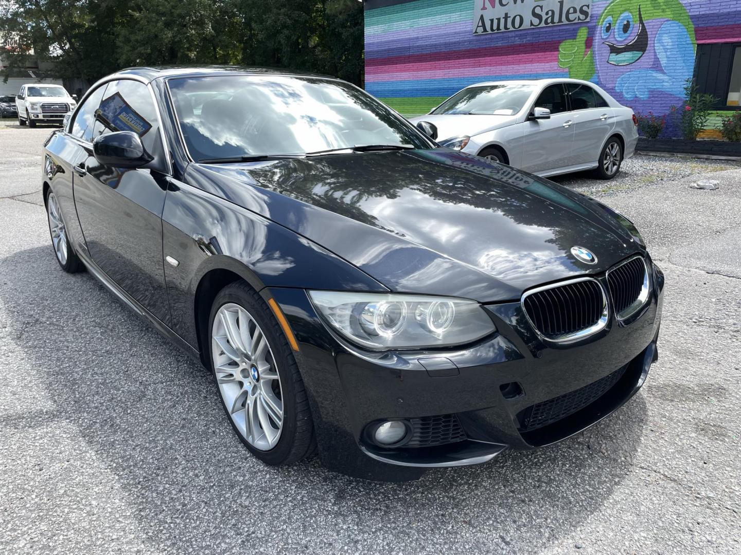 2013 BLACK BMW 3 SERIES 335I (WBADX7C59DE) with an 3.0L engine, Automatic transmission, located at 5103 Dorchester Rd., Charleston, SC, 29418-5607, (843) 767-1122, 36.245171, -115.228050 - Hardtop Convertible with Leather, Navigation, CD/AUX, Hand-free Phone, Dual Climate Control, Power Everything (windows, locks, seats, mirrors), Heated Seats, Push Button Start, Keyless Entry, Alloy Wheels. 107k Located at New Life Auto Sales! 2023 WINNER for Post & Courier's Charleston's Choice Pre - Photo#0