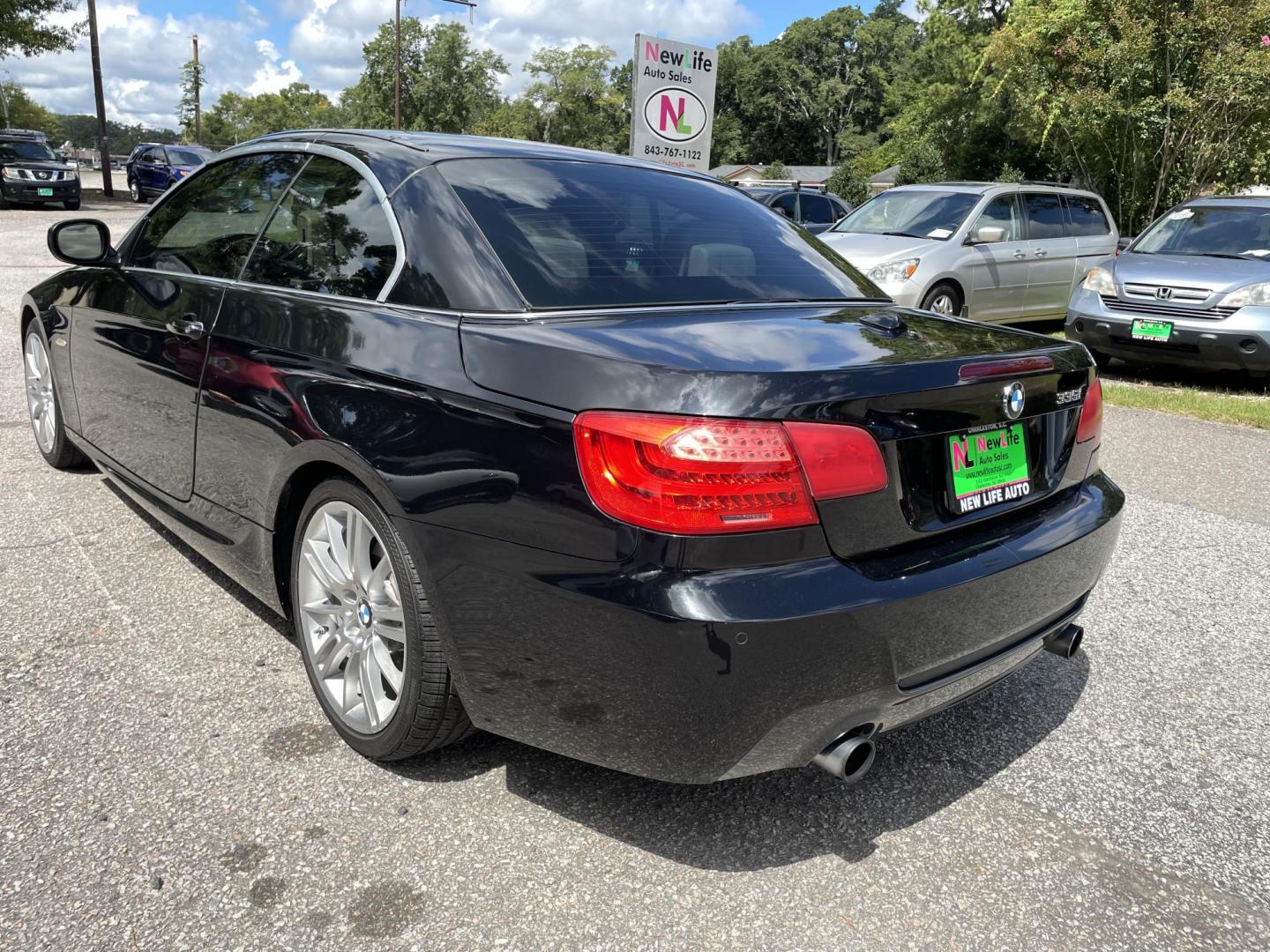 2013 BLACK BMW 3 SERIES 335I (WBADX7C59DE) with an 3.0L engine, Automatic transmission, located at 5103 Dorchester Rd., Charleston, SC, 29418-5607, (843) 767-1122, 36.245171, -115.228050 - Hardtop Convertible with Leather, Navigation, CD/AUX, Hand-free Phone, Dual Climate Control, Power Everything (windows, locks, seats, mirrors), Heated Seats, Push Button Start, Keyless Entry, Alloy Wheels. 107k Located at New Life Auto Sales! 2023 WINNER for Post & Courier's Charleston's Choice Pre - Photo#7