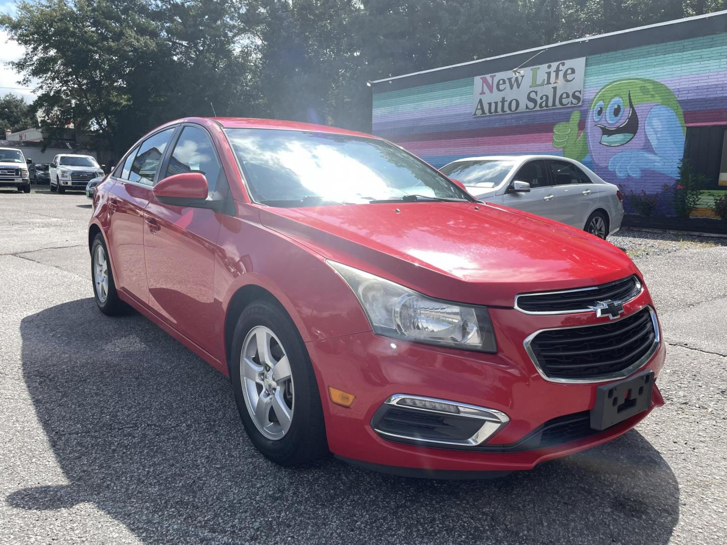 2015 RED CHEVROLET CRUZE 1LT AUTO (1G1PC5SB4F7) with an 1.4L engine, Automatic transmission, located at 5103 Dorchester Rd., Charleston, SC, 29418-5607, (843) 767-1122, 36.245171, -115.228050 - Clean interior with CD/AUX/Sat/Bluetooth, Backup Camera, Power Windows, Power Locks, Power Mirrors, Keyless Entry, Alloy Wheels. Clean CarFax (no accidents reported!) Local Trade-in! Certified One Owner!! 122k miles Located at New Life Auto Sales! 2023 WINNER for Post & Courier's Charleston's Choic - Photo#0