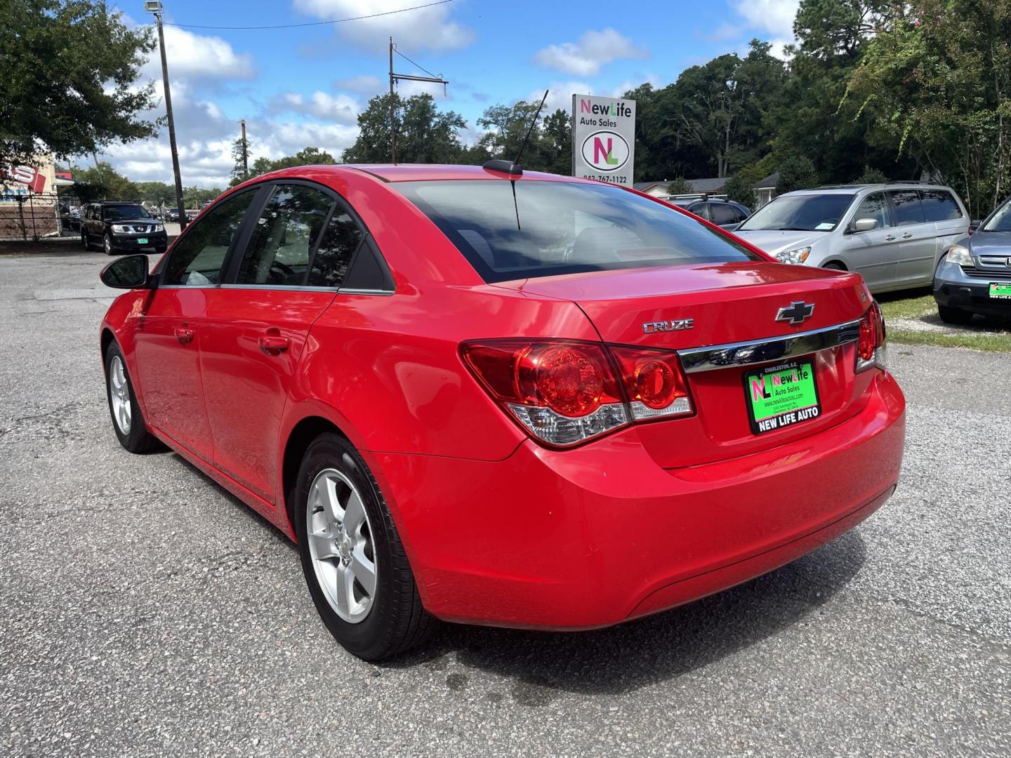 2015 RED CHEVROLET CRUZE 1LT AUTO (1G1PC5SB4F7) with an 1.4L engine, Automatic transmission, located at 5103 Dorchester Rd., Charleston, SC, 29418-5607, (843) 767-1122, 36.245171, -115.228050 - Clean interior with CD/AUX/Sat/Bluetooth, Backup Camera, Power Windows, Power Locks, Power Mirrors, Keyless Entry, Alloy Wheels. Clean CarFax (no accidents reported!) Local Trade-in! Certified One Owner!! 122k miles Located at New Life Auto Sales! 2023 WINNER for Post & Courier's Charleston's Choic - Photo#4