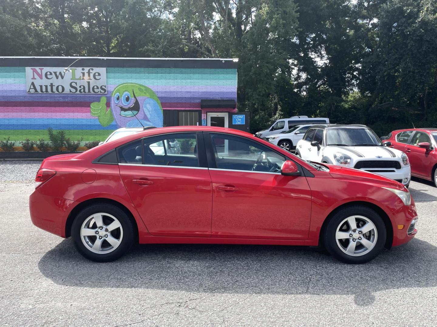 2015 RED CHEVROLET CRUZE 1LT AUTO (1G1PC5SB4F7) with an 1.4L engine, Automatic transmission, located at 5103 Dorchester Rd., Charleston, SC, 29418-5607, (843) 767-1122, 36.245171, -115.228050 - Clean interior with CD/AUX/Sat/Bluetooth, Backup Camera, Power Windows, Power Locks, Power Mirrors, Keyless Entry, Alloy Wheels. Clean CarFax (no accidents reported!) Local Trade-in! Certified One Owner!! 122k miles Located at New Life Auto Sales! 2023 WINNER for Post & Courier's Charleston's Choic - Photo#6