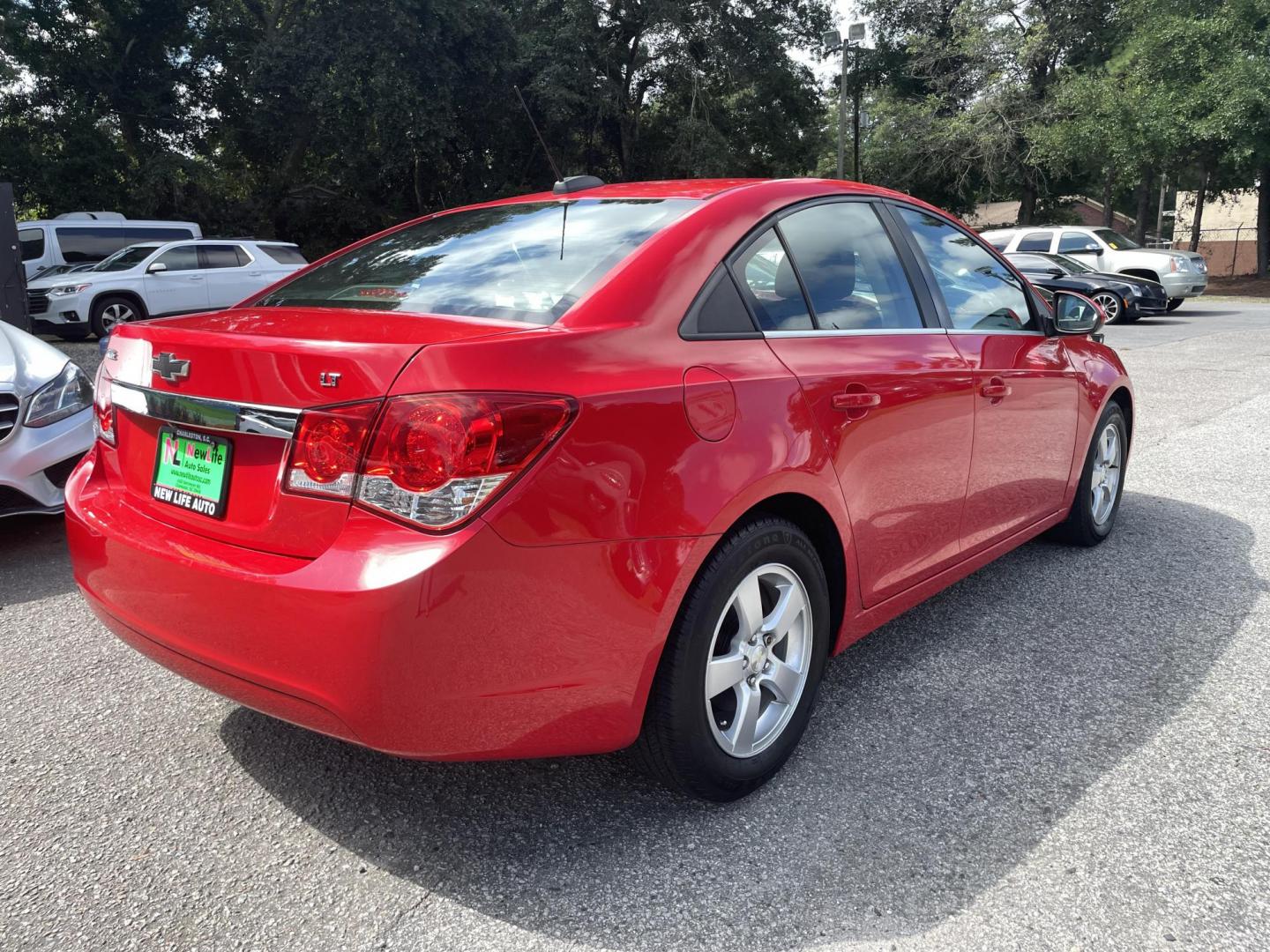 2015 RED CHEVROLET CRUZE 1LT AUTO (1G1PC5SB4F7) with an 1.4L engine, Automatic transmission, located at 5103 Dorchester Rd., Charleston, SC, 29418-5607, (843) 767-1122, 36.245171, -115.228050 - Clean interior with CD/AUX/Sat/Bluetooth, Backup Camera, Power Windows, Power Locks, Power Mirrors, Keyless Entry, Alloy Wheels. Clean CarFax (no accidents reported!) Local Trade-in! Certified One Owner!! 122k miles Located at New Life Auto Sales! 2023 WINNER for Post & Courier's Charleston's Choic - Photo#8