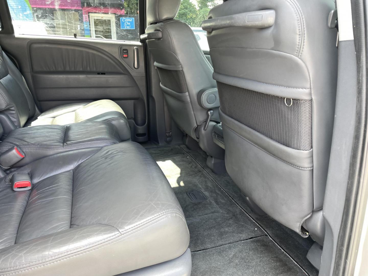 2007 SILVER HONDA ODYSSEY EX-L W/DVD (5FNRL38737B) with an 3.5L engine, Automatic transmission, located at 5103 Dorchester Rd., Charleston, SC, 29418-5607, (843) 767-1122, 36.245171, -115.228050 - Leather, Sunroof, 6-Disc CD/Aux/Sat, Dual Climate Control, Power Everything (windows, locks, seat, mirrors), Heated Seats, Power Sliding Doors, Rear Climate Control, Rear DVD, Keyless Entry, Alloy Wheels. Local Trade-in!! 157k miles Located at New Life Auto Sales! 2023 WINNER for Post & Courier's C - Photo#9