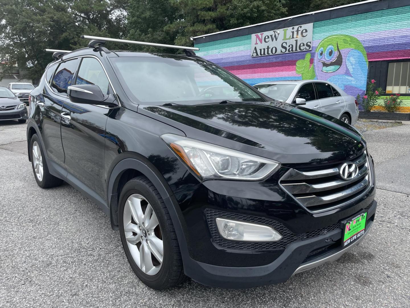 2014 BLACK HYUNDAI SANTA FE SPORT 2.0T (5XYZWDLA2EG) with an 2.0L engine, Automatic transmission, located at 5103 Dorchester Rd., Charleston, SC, 29418-5607, (843) 767-1122, 36.245171, -115.228050 - Photo#0