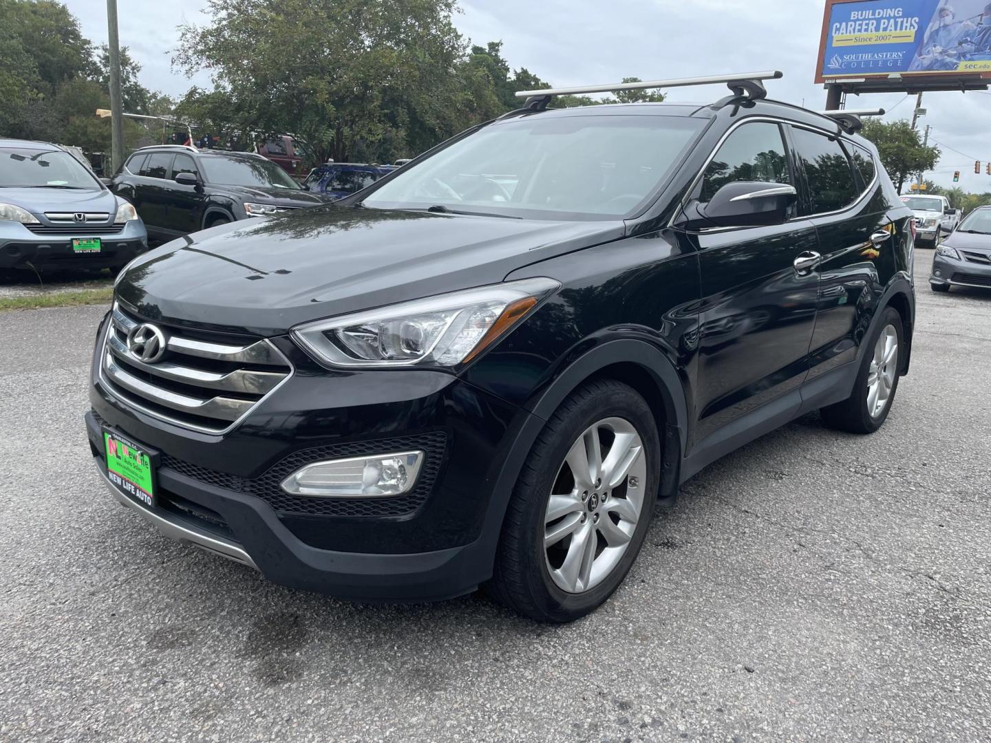 2014 BLACK HYUNDAI SANTA FE SPORT 2.0T (5XYZWDLA2EG) with an 2.0L engine, Automatic transmission, located at 5103 Dorchester Rd., Charleston, SC, 29418-5607, (843) 767-1122, 36.245171, -115.228050 - Beautiful Peanut Butter Leather Interior with Panoramic Sunroof, Navigation, Backup Camera, CD/AUX/Bluetooth, Dual Climate Control, Power Everything (windows, locks, seats, mirrors), Heated/Cooled/Memory Front Seats, Heated Rear Seats, Heated Steering Wheel, Push Button Start, Keyless Entry, Sport R - Photo#2