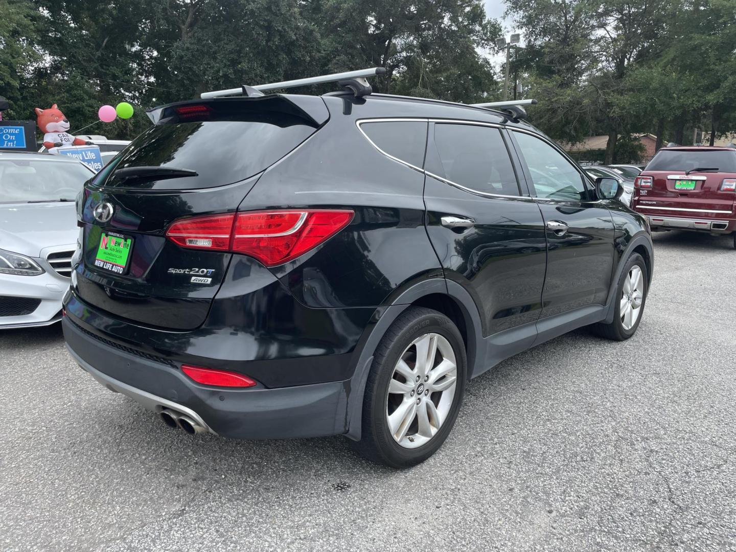 2014 BLACK HYUNDAI SANTA FE SPORT 2.0T (5XYZWDLA2EG) with an 2.0L engine, Automatic transmission, located at 5103 Dorchester Rd., Charleston, SC, 29418-5607, (843) 767-1122, 36.245171, -115.228050 - Beautiful Peanut Butter Leather Interior with Panoramic Sunroof, Navigation, Backup Camera, CD/AUX/Bluetooth, Dual Climate Control, Power Everything (windows, locks, seats, mirrors), Heated/Cooled/Memory Front Seats, Heated Rear Seats, Heated Steering Wheel, Push Button Start, Keyless Entry, Sport R - Photo#6