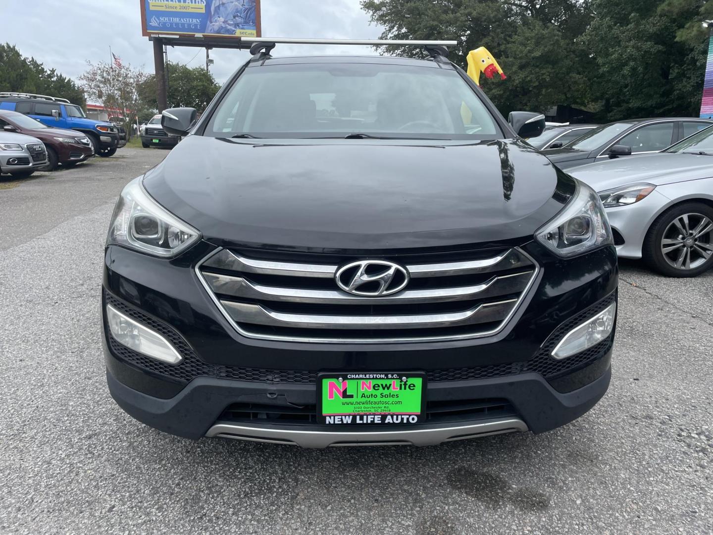 2014 BLACK HYUNDAI SANTA FE SPORT 2.0T (5XYZWDLA2EG) with an 2.0L engine, Automatic transmission, located at 5103 Dorchester Rd., Charleston, SC, 29418-5607, (843) 767-1122, 36.245171, -115.228050 - Beautiful Peanut Butter Leather Interior with Panoramic Sunroof, Navigation, Backup Camera, CD/AUX/Bluetooth, Dual Climate Control, Power Everything (windows, locks, seats, mirrors), Heated/Cooled/Memory Front Seats, Heated Rear Seats, Heated Steering Wheel, Push Button Start, Keyless Entry, Sport R - Photo#1