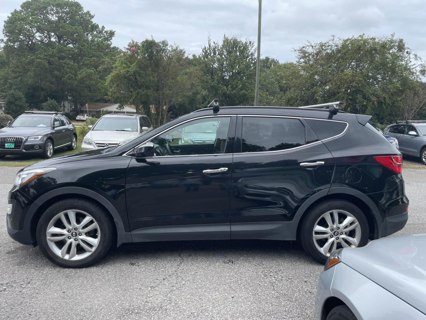 2014 BLACK HYUNDAI SANTA FE SPORT 2.0T (5XYZWDLA2EG) with an 2.0L engine, Automatic transmission, located at 5103 Dorchester Rd., Charleston, SC, 29418-5607, (843) 767-1122, 36.245171, -115.228050 - Beautiful Peanut Butter Leather Interior with Panoramic Sunroof, Navigation, Backup Camera, CD/AUX/Bluetooth, Dual Climate Control, Power Everything (windows, locks, seats, mirrors), Heated/Cooled/Memory Front Seats, Heated Rear Seats, Heated Steering Wheel, Push Button Start, Keyless Entry, Sport R - Photo#3