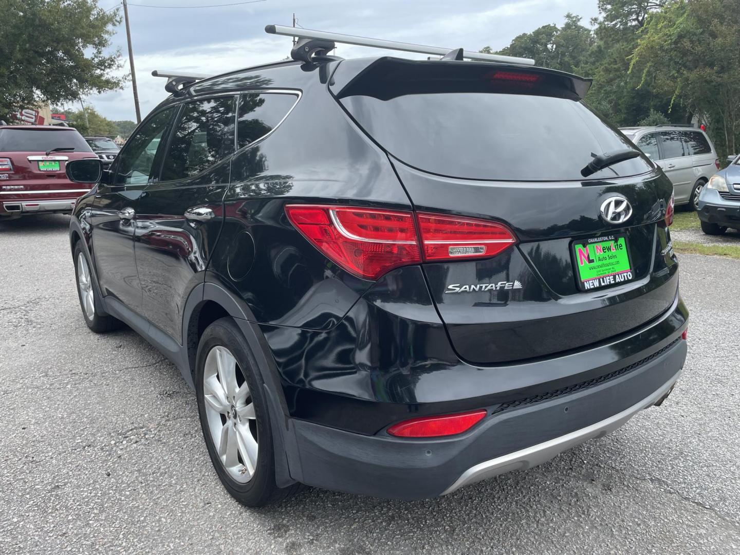 2014 BLACK HYUNDAI SANTA FE SPORT 2.0T (5XYZWDLA2EG) with an 2.0L engine, Automatic transmission, located at 5103 Dorchester Rd., Charleston, SC, 29418-5607, (843) 767-1122, 36.245171, -115.228050 - Photo#4