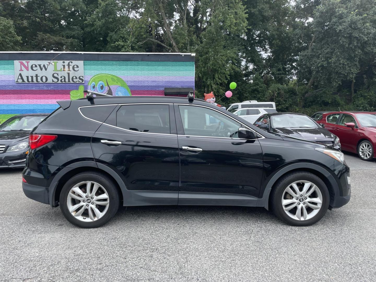 2014 BLACK HYUNDAI SANTA FE SPORT 2.0T (5XYZWDLA2EG) with an 2.0L engine, Automatic transmission, located at 5103 Dorchester Rd., Charleston, SC, 29418-5607, (843) 767-1122, 36.245171, -115.228050 - Beautiful Peanut Butter Leather Interior with Panoramic Sunroof, Navigation, Backup Camera, CD/AUX/Bluetooth, Dual Climate Control, Power Everything (windows, locks, seats, mirrors), Heated/Cooled/Memory Front Seats, Heated Rear Seats, Heated Steering Wheel, Push Button Start, Keyless Entry, Sport R - Photo#7