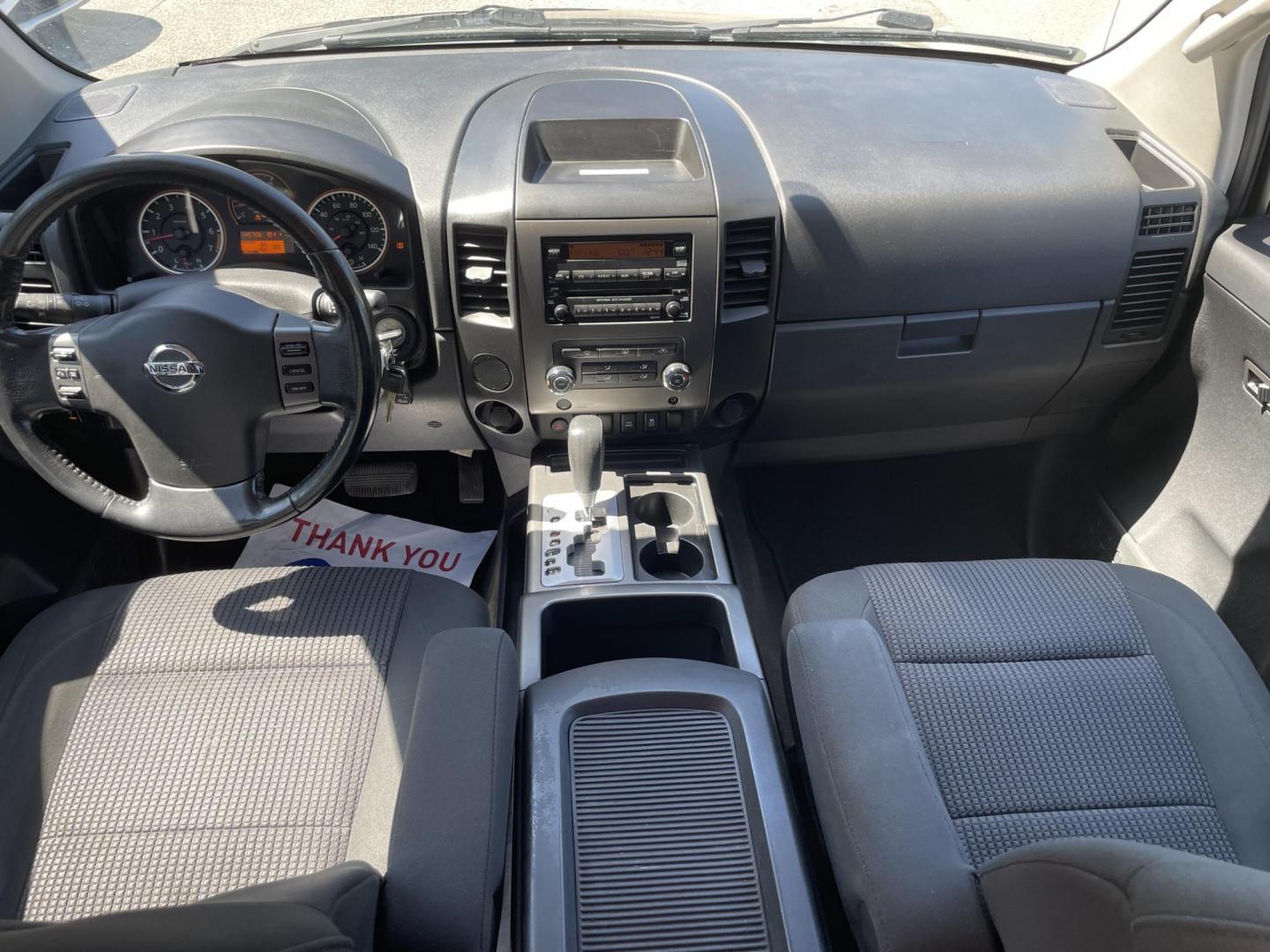 2012 GRAY NISSAN TITAN SV (1N6BA0ED8CN) with an 5.6L engine, Automatic transmission, located at 5103 Dorchester Rd., Charleston, SC, 29418-5607, (843) 767-1122, 36.245171, -115.228050 - Local Trade-in with Clean Interior, CD/AUX, Power Everything (windows, locks, seat, mirrors), Keyless Entry, Running Boards, Tow Package, Bed Liner, Alloy Wheels. Clean CarFax (no accidents reported!) 145k miles Located at New Life Auto Sales! 2023 WINNER for Post & Courier's Charleston's Choice Pr - Photo#14