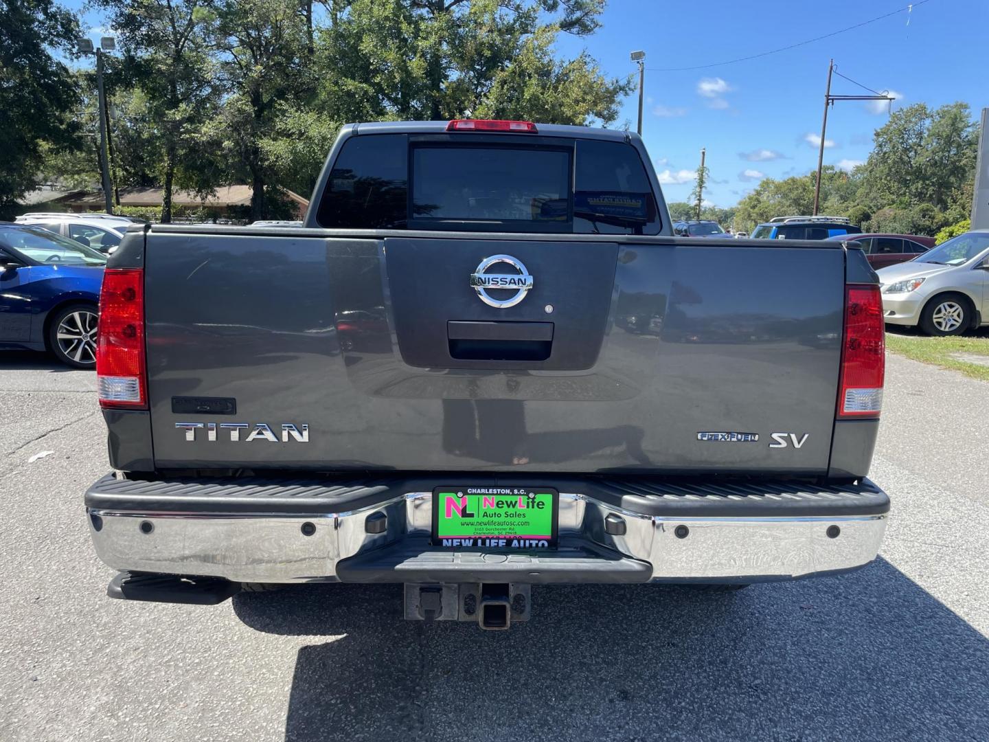 2012 GRAY NISSAN TITAN SV (1N6BA0ED8CN) with an 5.6L engine, Automatic transmission, located at 5103 Dorchester Rd., Charleston, SC, 29418-5607, (843) 767-1122, 36.245171, -115.228050 - Local Trade-in with Clean Interior, CD/AUX, Power Everything (windows, locks, seat, mirrors), Keyless Entry, Running Boards, Tow Package, Bed Liner, Alloy Wheels. Clean CarFax (no accidents reported!) 145k miles Located at New Life Auto Sales! 2023 WINNER for Post & Courier's Charleston's Choice Pr - Photo#7