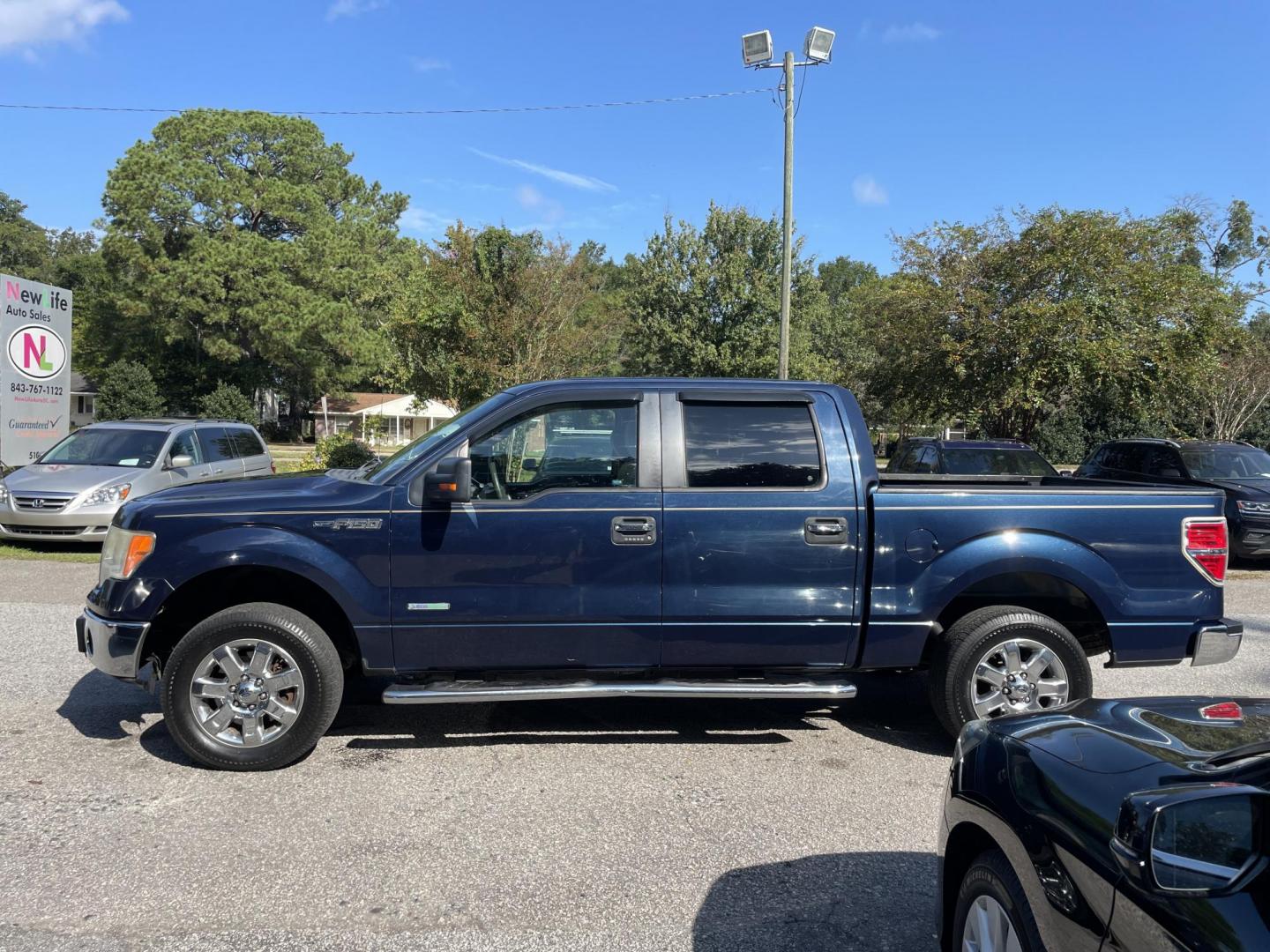 2014 BLUE FORD F-150 XLt (1FTFW1CT7EK) with an 3.5L engine, Automatic transmission, located at 5103 Dorchester Rd., Charleston, SC, 29418-5607, (843) 767-1122, 36.245171, -115.228050 - Spacious Interior with CD/AUX/Sat, Hands-free Phone, Power Everything (windows, locks, seat, mirrors), Keyless Entry, Running Boards, Bedliner, Tow Package with Brake Assist, Alloy Wheels. Clean CarFax (no accidents reported!) 154k miles Located at New Life Auto Sales! 2023 WINNER for Post & Couri - Photo#2