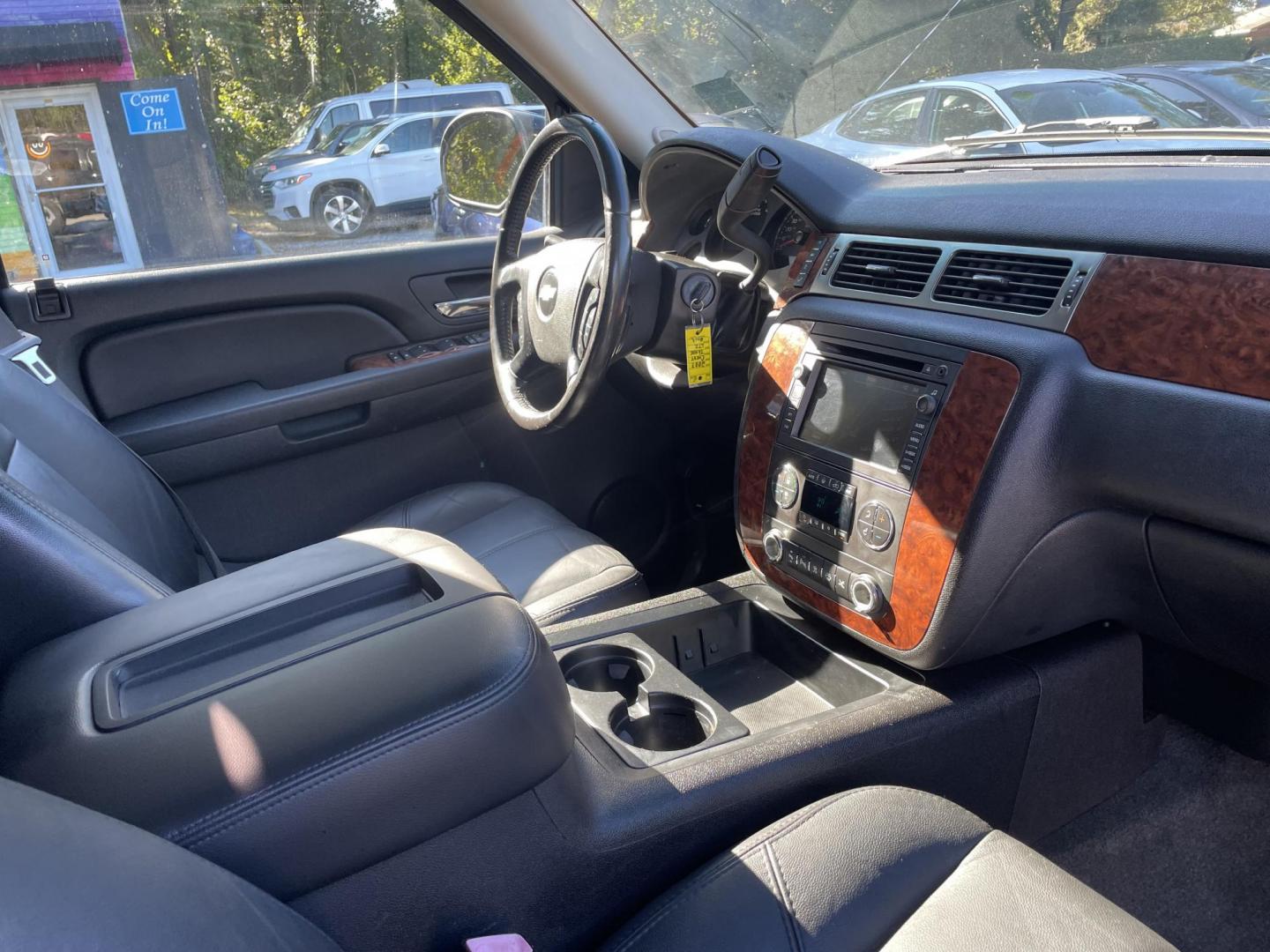 2007 BLACK CHEVROLET TAHOE LTZ (1GNFK13057R) with an 5.3L engine, Automatic transmission, located at 5103 Dorchester Rd., Charleston, SC, 29418-5607, (843) 767-1122, 36.245171, -115.228050 - Leather, Sunroof, Navigation, Backup Camera, CD/Aux/Sat, OnStar, Dual Climate Control, Power Everything (windows, locks, seats, mirrors), Heated/Memory Seating, Power Liftgate, Keyless Entry, Middle Row Captain's Seats, Convenient Third Row, Alloy Wheels. 226k miles Located at New Life Auto Sales! - Photo#10