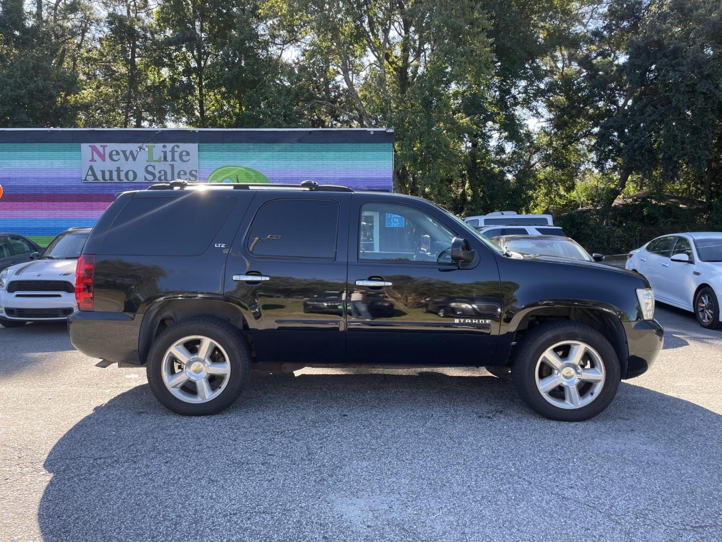 2007 BLACK CHEVROLET TAHOE LTZ (1GNFK13057R) with an 5.3L engine, Automatic transmission, located at 5103 Dorchester Rd., Charleston, SC, 29418-5607, (843) 767-1122, 36.245171, -115.228050 - Leather, Sunroof, Navigation, Backup Camera, CD/Aux/Sat, OnStar, Dual Climate Control, Power Everything (windows, locks, seats, mirrors), Heated/Memory Seating, Power Liftgate, Keyless Entry, Middle Row Captain's Seats, Convenient Third Row, Alloy Wheels. 226k miles Located at New Life Auto Sales! - Photo#13