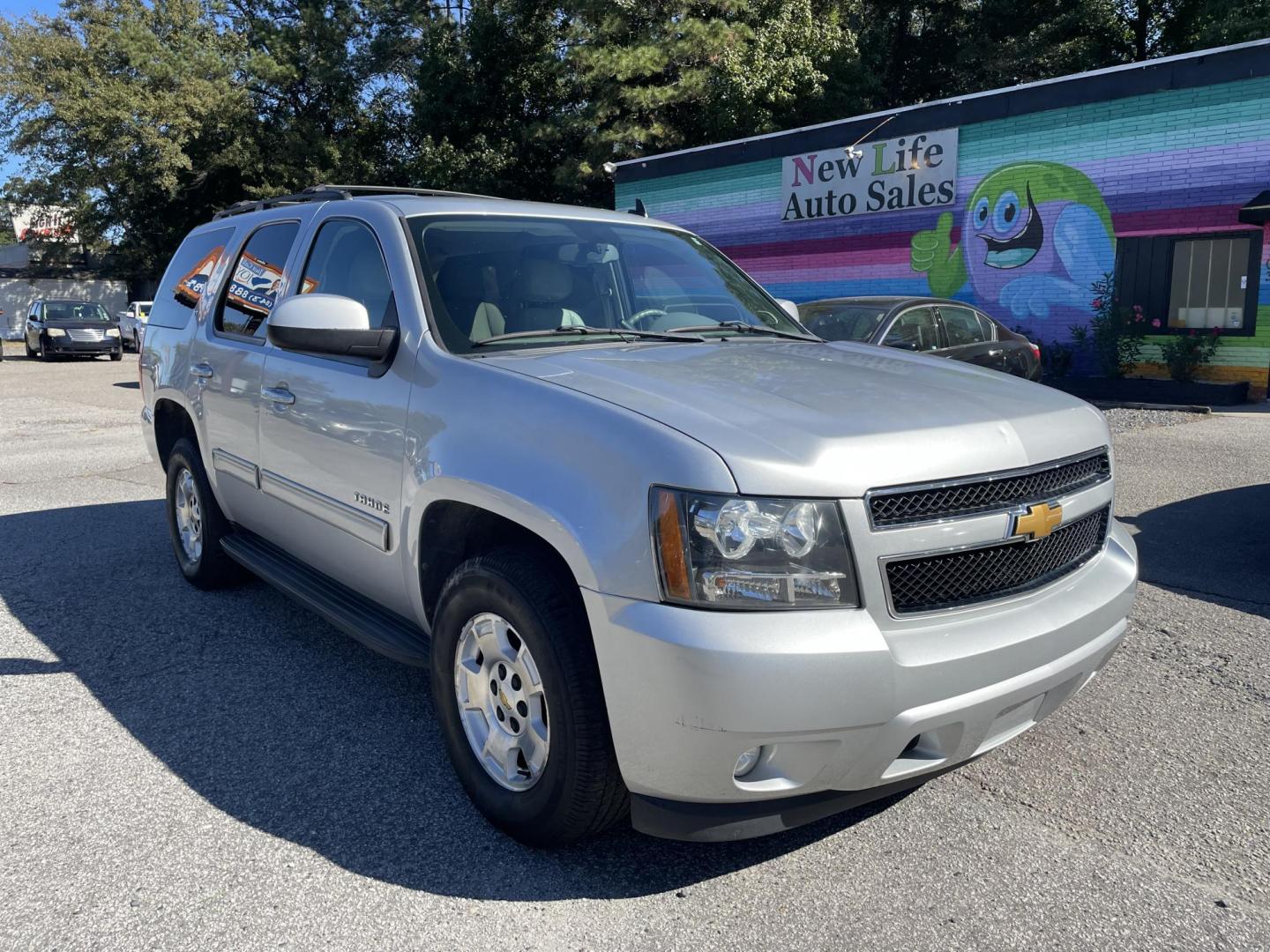 2012 SILVER CHEVROLET TAHOE LT (1GNSCBE09CR) with an 5.3L engine, Automatic transmission, located at 5103 Dorchester Rd., Charleston, SC, 29418-5607, (843) 767-1122, 36.245171, -115.228050 - Leather, CD/AUX/SAT, OnStar, Dual Climate Control, Power Everything (windows, locks, seats, mirrors), Heated Seats, Keyless Entry, Middle Bench Seat, Convenient Third Row, Running Boards, Tow Package, Alloy Wheels. 236k miles Located at New Life Auto Sales! 2023 WINNER for Post & Courier's Charlest - Photo#0