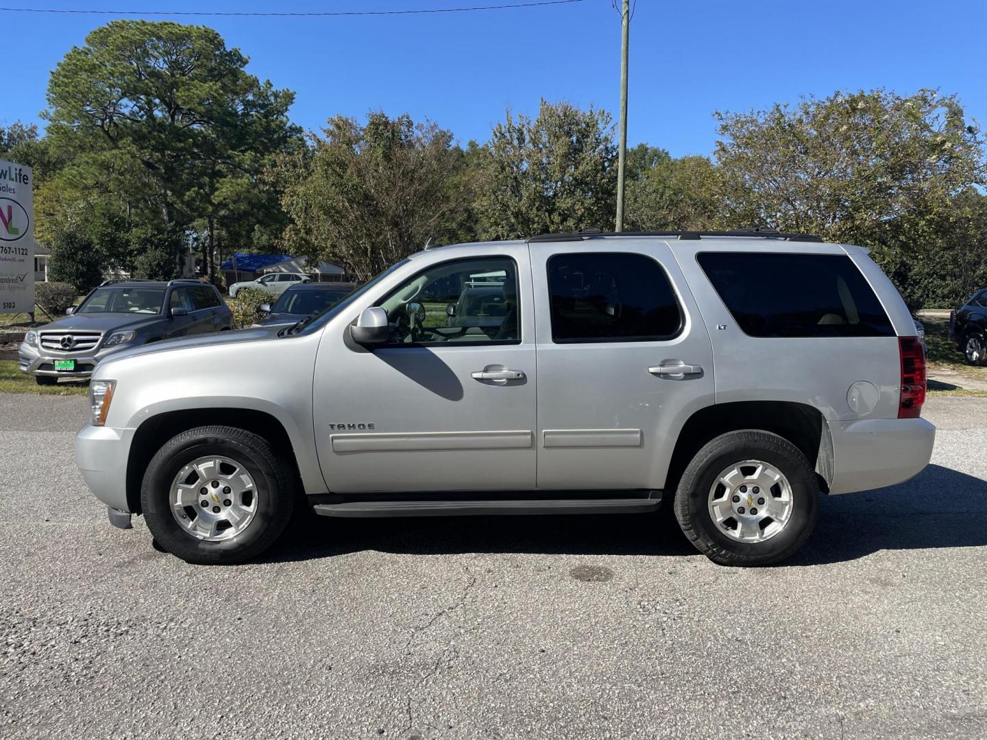 2012 SILVER CHEVROLET TAHOE LT (1GNSCBE09CR) with an 5.3L engine, Automatic transmission, located at 5103 Dorchester Rd., Charleston, SC, 29418-5607, (843) 767-1122, 36.245171, -115.228050 - Leather, CD/AUX/SAT, OnStar, Dual Climate Control, Power Everything (windows, locks, seats, mirrors), Heated Seats, Keyless Entry, Middle Bench Seat, Convenient Third Row, Running Boards, Tow Package, Alloy Wheels. 236k miles Located at New Life Auto Sales! 2023 WINNER for Post & Courier's Charlest - Photo#5