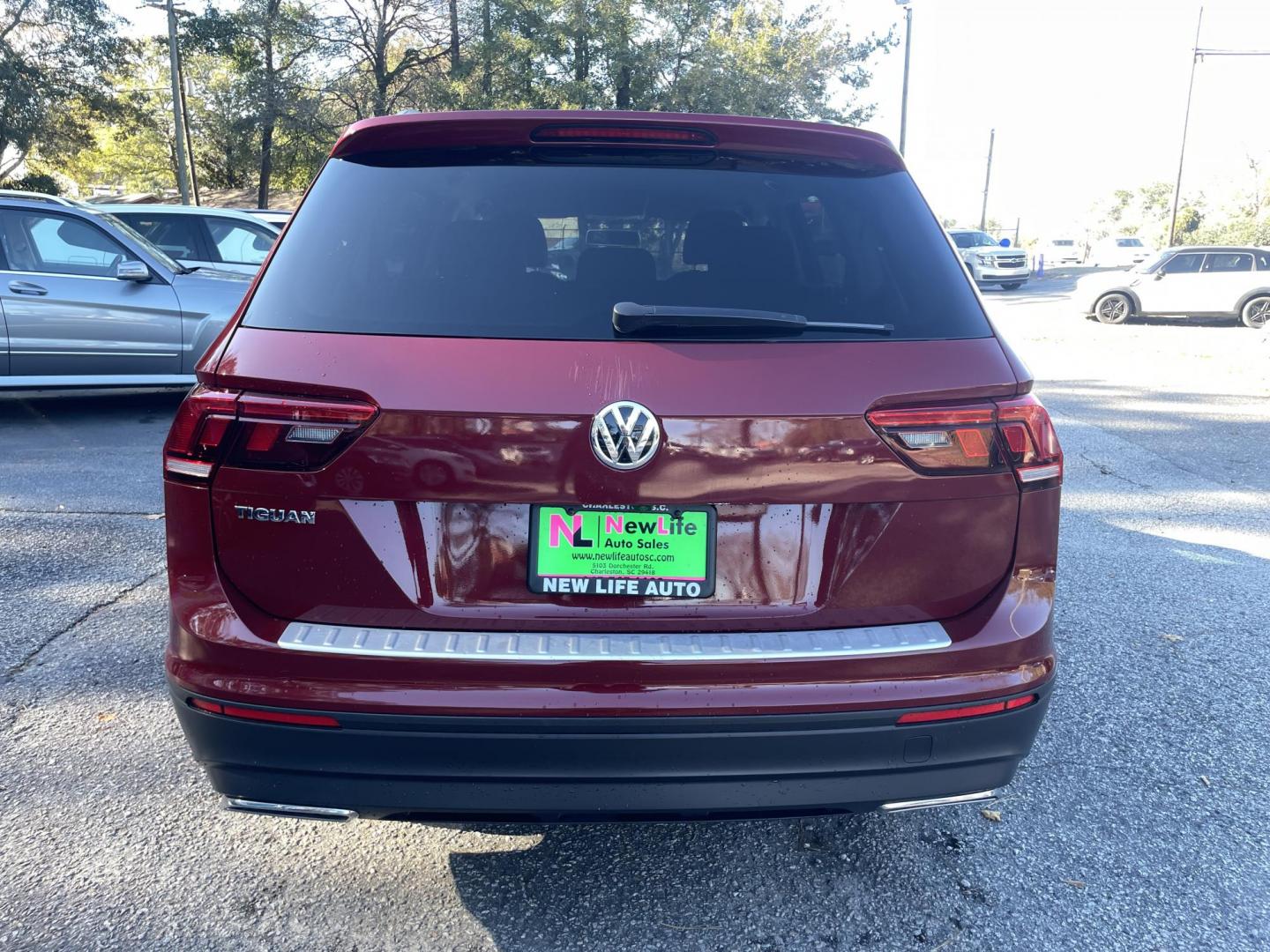 2018 RED VOLKSWAGEN TIGUAN 2.0T S (3VV1B7AX2JM) with an 2.0L engine, Automatic transmission, located at 5103 Dorchester Rd., Charleston, SC, 29418-5607, (843) 767-1122, 36.245171, -115.228050 - Super Clean Interior with Apple CarPlay, Android Auto, MirrorLink, AUX/Radio, Backup Camera, Powe Windows, Power Locks, Power Mirrors, Convenient Third Row with Easy Fold Seats, Keyless Entry, Alloy Wheels. Local Trade-in! Only 84k miles Located at New Life Auto Sales! 2023 WINNER for Post & Courie - Photo#4