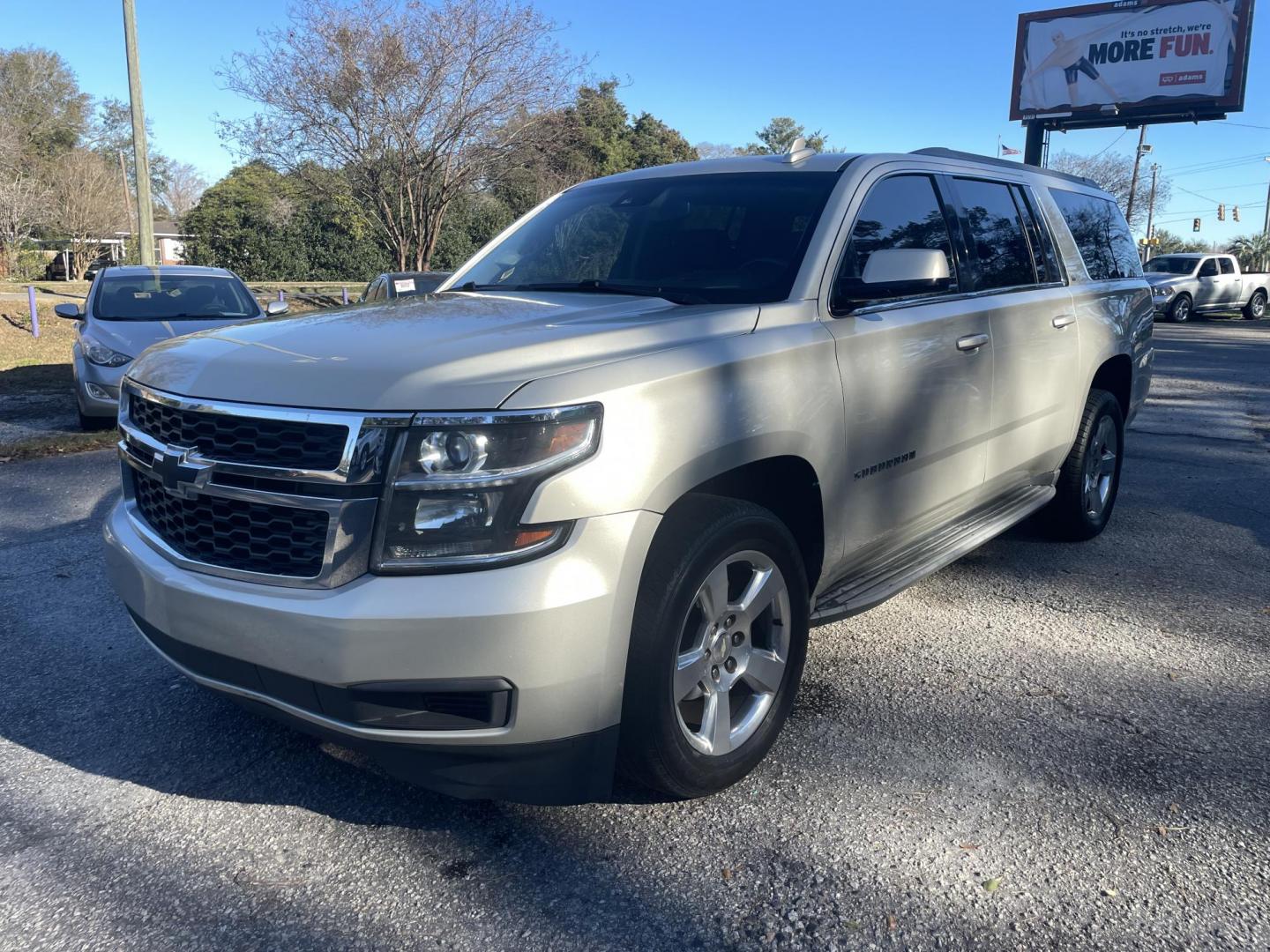 2016 GOLD CHEVROLET SUBURBAN LT (1GNSCHKC8GR) with an 5.3L engine, Automatic transmission, located at 5103 Dorchester Rd., Charleston, SC, 29418-5607, (843) 767-1122, 36.245171, -115.228050 - Clean & Spacious, Leather, Sunroof, OnStar Navigation, SAT/AUX/Bluetooth, Backup Camera, Dual Climate Control, Power Everything (windows, locks, seats, mirrors), Heated/Memory Seating, Rear Climate Control, Third Row, Spacious Cargo, Power Liftgate, Keyless Entry, Running Boards, Tow Package, Alloy - Photo#2