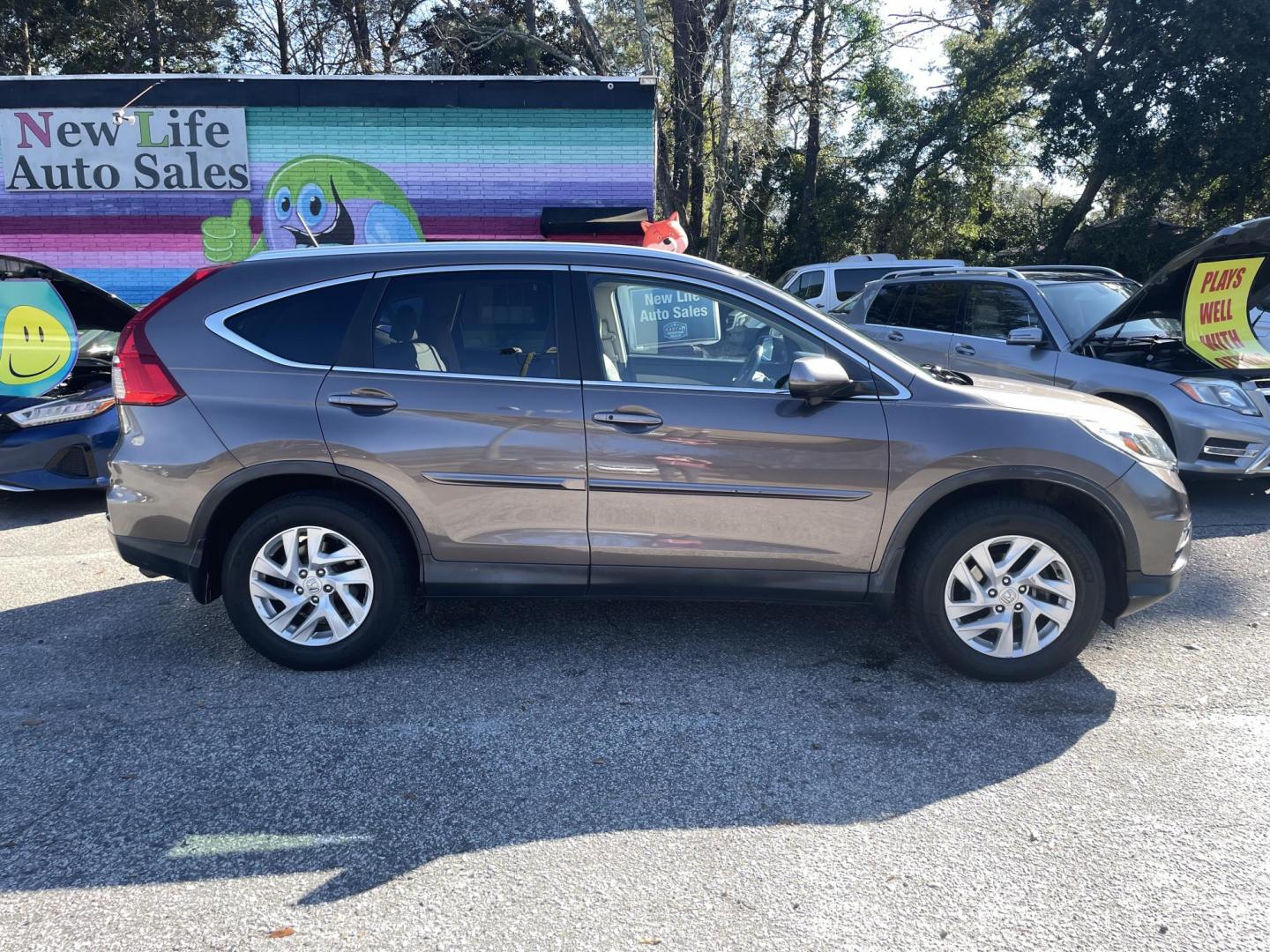 2015 BROWN HONDA CR-V EX-L (2HKRM4H70FH) with an 2.4L engine, Continuously Variable transmission, located at 5103 Dorchester Rd., Charleston, SC, 29418-5607, (843) 767-1122, 36.245171, -115.228050 - Local Trade-in with Leather, Sunroof, Navigation, Backup Camera, AUX/USB/Sat/Bluetooth, Dual Climate Control, Power Everything (windows, locks, seat, mirrors), Heated Seats, Push Button Start, Keyless Entry, Alloy Wheels. 144k miles Located at New Life Auto Sales! 2023 WINNER for Post & Courier's C - Photo#11