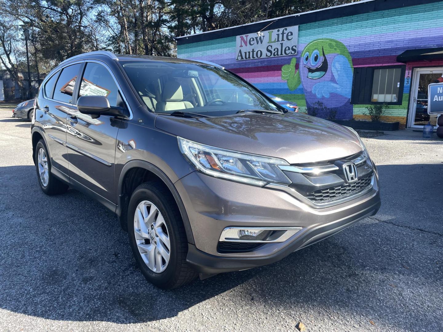 2015 BROWN HONDA CR-V EX-L (2HKRM4H70FH) with an 2.4L engine, Continuously Variable transmission, located at 5103 Dorchester Rd., Charleston, SC, 29418-5607, (843) 767-1122, 36.245171, -115.228050 - Local Trade-in with Leather, Sunroof, Navigation, Backup Camera, AUX/USB/Sat/Bluetooth, Dual Climate Control, Power Everything (windows, locks, seat, mirrors), Heated Seats, Push Button Start, Keyless Entry, Alloy Wheels. 144k miles Located at New Life Auto Sales! 2023 WINNER for Post & Courier's C - Photo#0