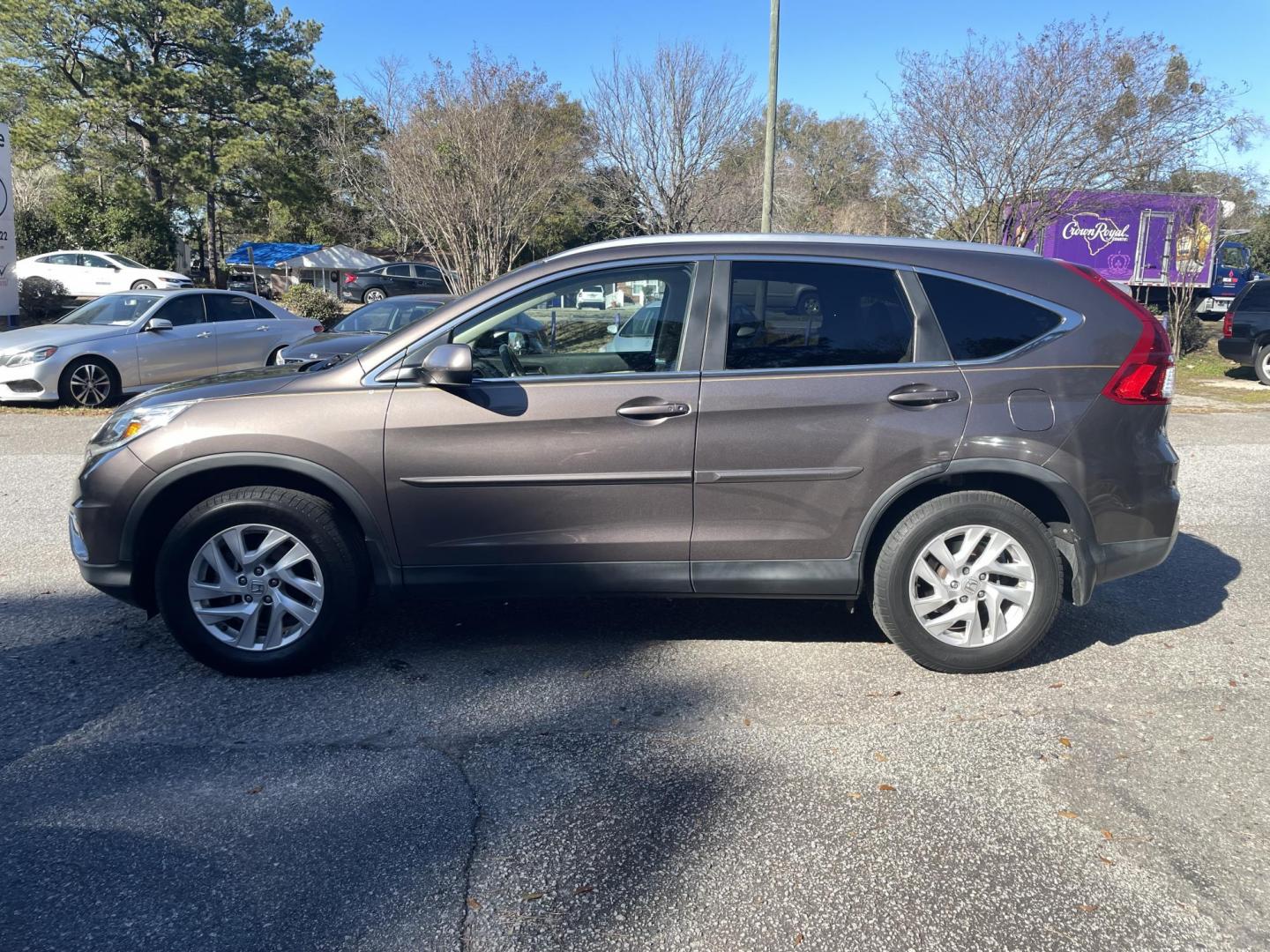 2015 BROWN HONDA CR-V EX-L (2HKRM4H70FH) with an 2.4L engine, Continuously Variable transmission, located at 5103 Dorchester Rd., Charleston, SC, 29418-5607, (843) 767-1122, 36.245171, -115.228050 - Local Trade-in with Leather, Sunroof, Navigation, Backup Camera, AUX/USB/Sat/Bluetooth, Dual Climate Control, Power Everything (windows, locks, seat, mirrors), Heated Seats, Push Button Start, Keyless Entry, Alloy Wheels. 144k miles Located at New Life Auto Sales! 2023 WINNER for Post & Courier's C - Photo#3