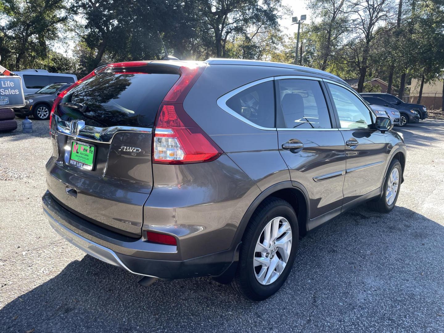 2015 BROWN HONDA CR-V EX-L (2HKRM4H70FH) with an 2.4L engine, Continuously Variable transmission, located at 5103 Dorchester Rd., Charleston, SC, 29418-5607, (843) 767-1122, 36.245171, -115.228050 - Photo#5