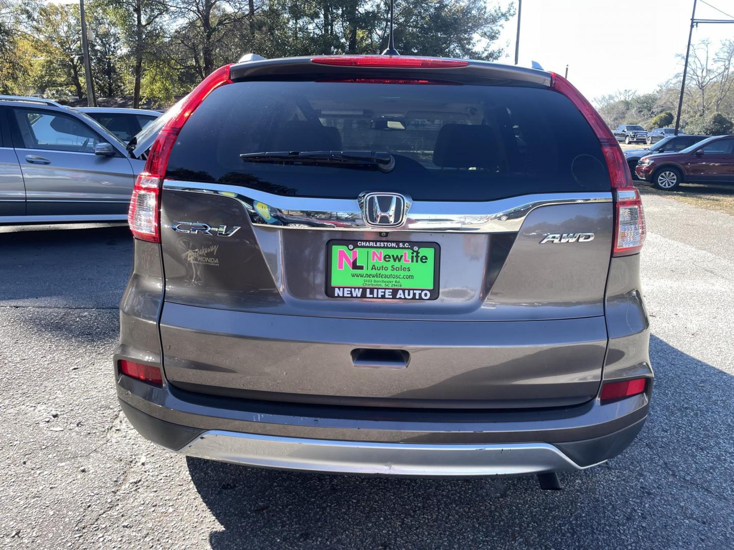 2015 BROWN HONDA CR-V EX-L (2HKRM4H70FH) with an 2.4L engine, Continuously Variable transmission, located at 5103 Dorchester Rd., Charleston, SC, 29418-5607, (843) 767-1122, 36.245171, -115.228050 - Photo#6